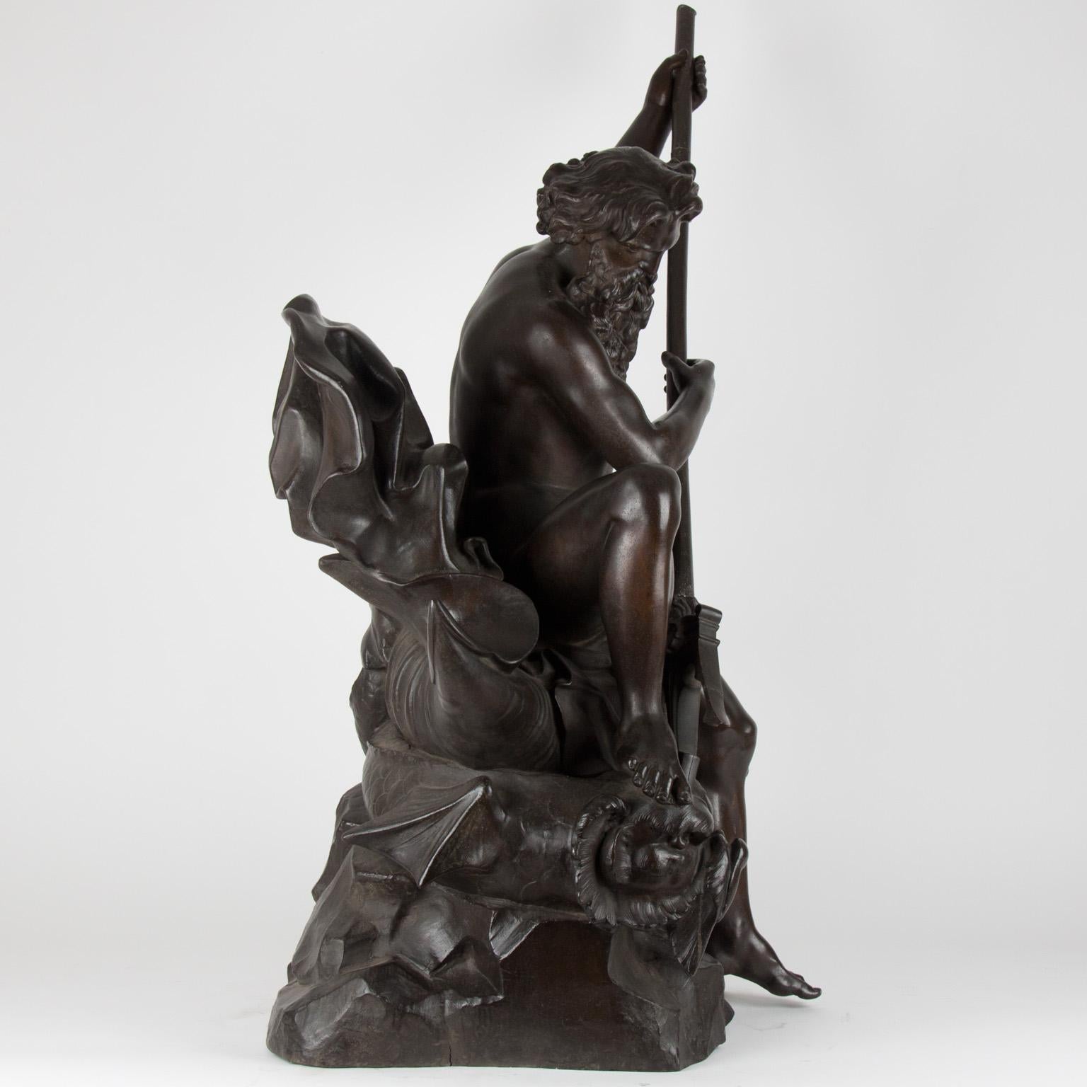 Patinated Large 19th Century Zamac Statue Depicting Neptune Sitting on Two Dolphins