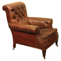 Grand fauteuil en cuir à dossier boutonné du 19e siècle