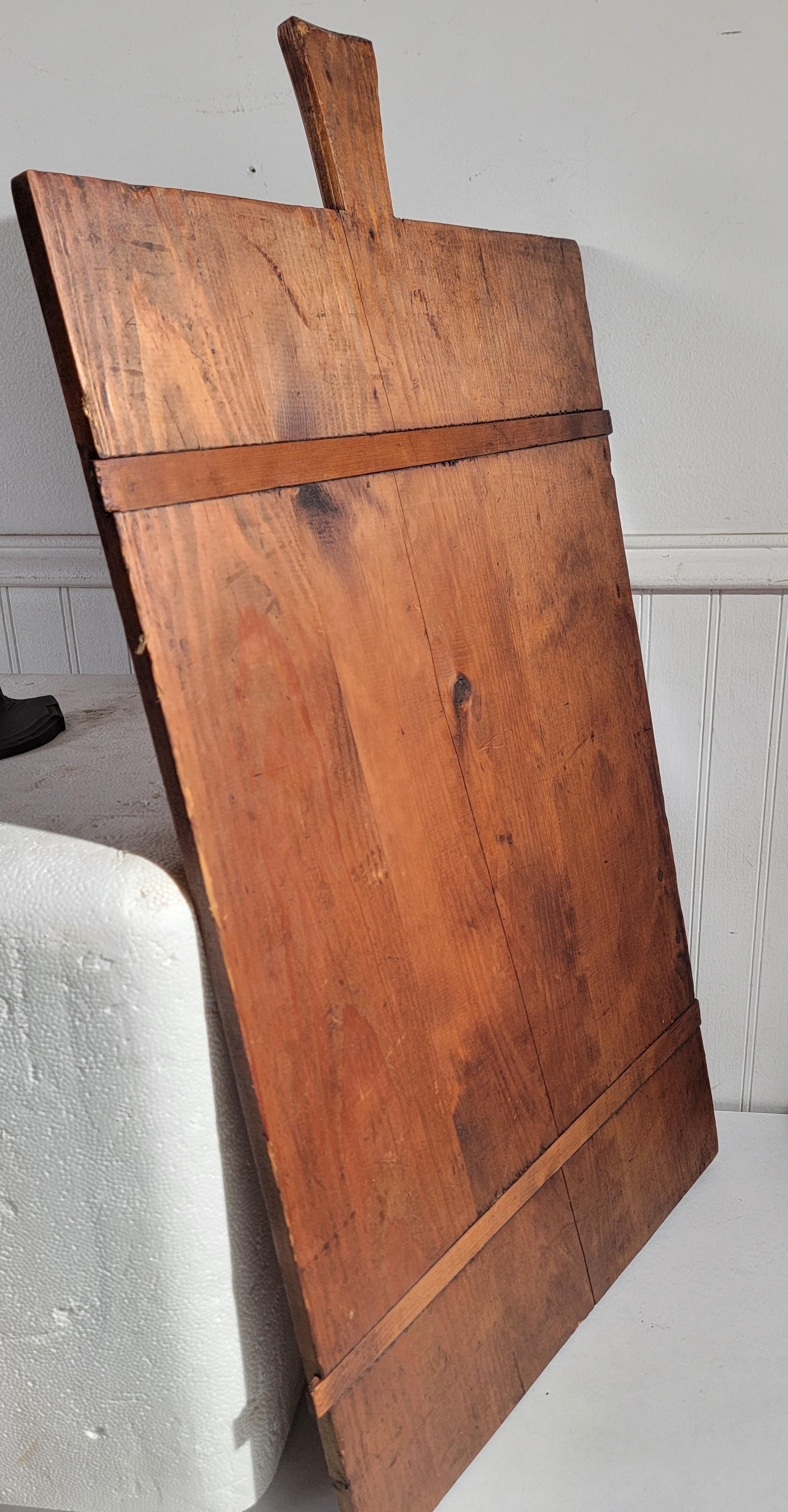 19Thc Hand crafted cutting board with handle in good condition.No cracks or damages.This was found in Pennsylvania.