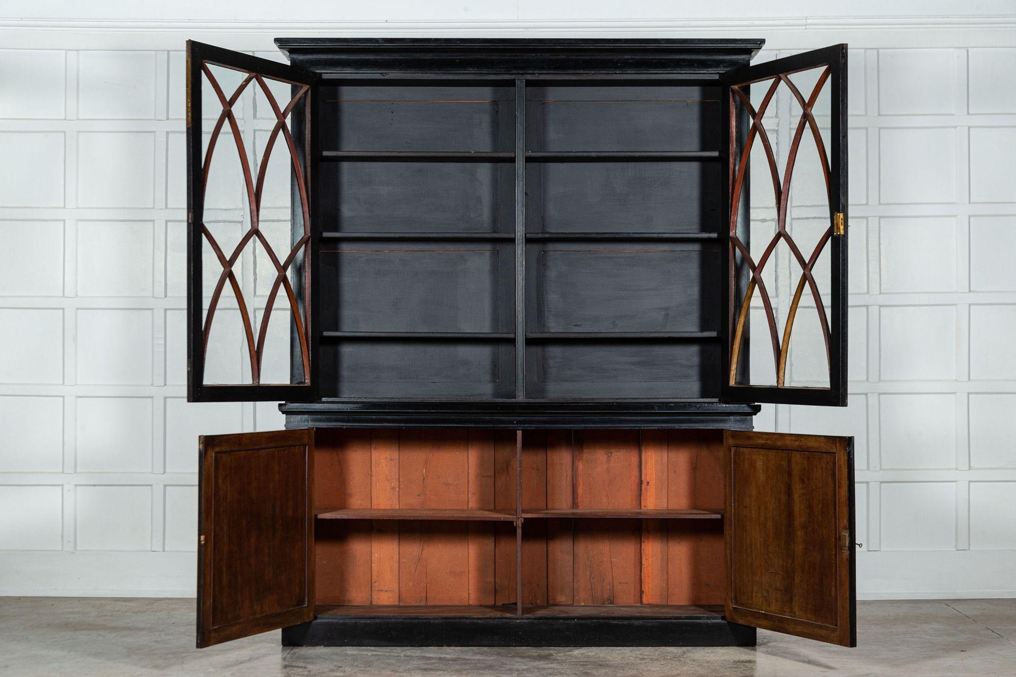 circa 1870
Large 19th century English Astral Glazed Ebonised & Lacquered Mahogany Bookcase Cabinet




sku 1482
Together W190 x D41 x H234 cm
Base W183 x D41 x H93 cm
Top W190 x D31 x H141 cm



