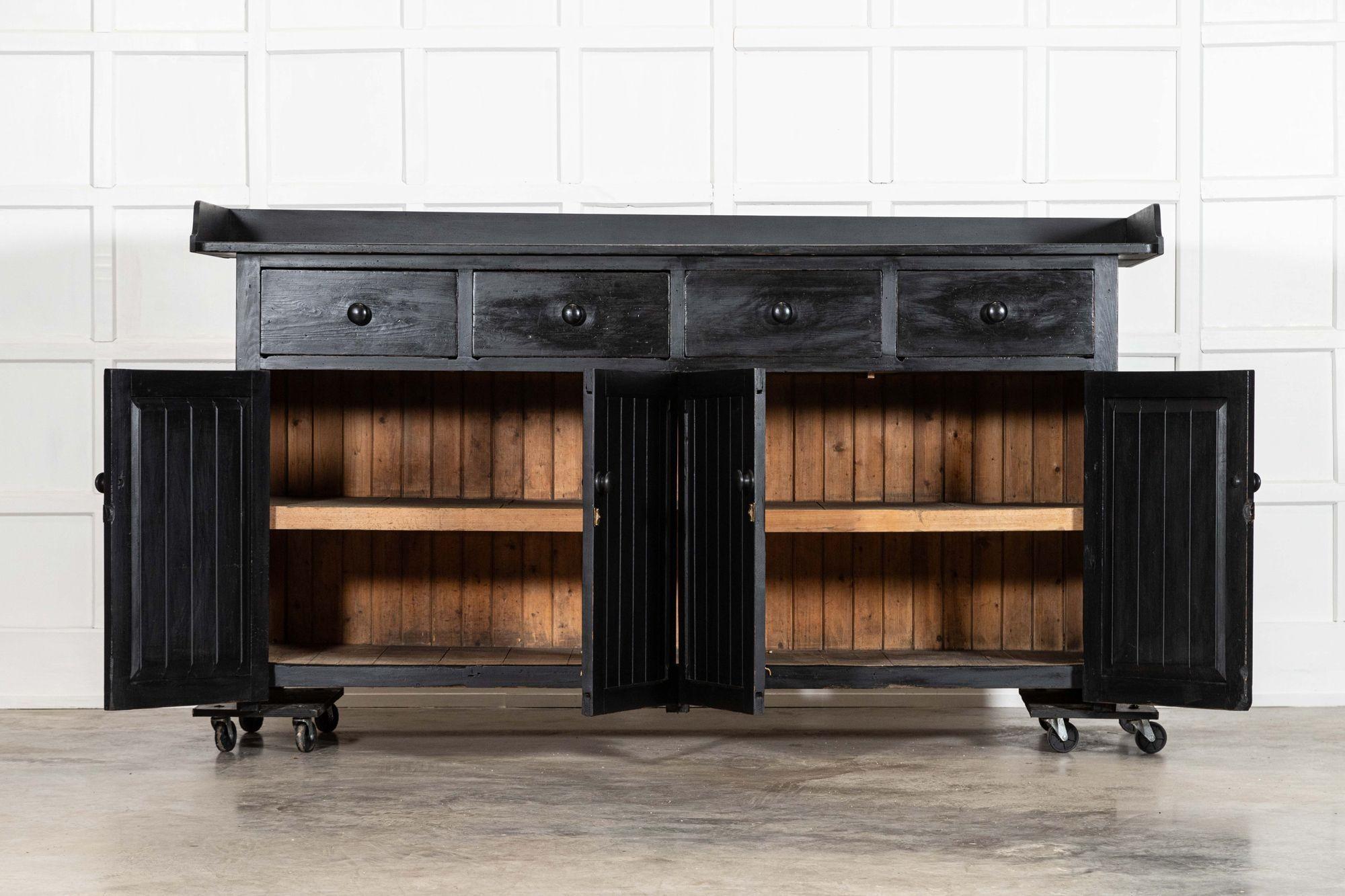 circa 1870
Large 19thC English Ebonised Pine Dresser Base

sku 1117B
W227 x D68 x H119 cm
Internal shelf depth 62 cm
Weight 137Kg