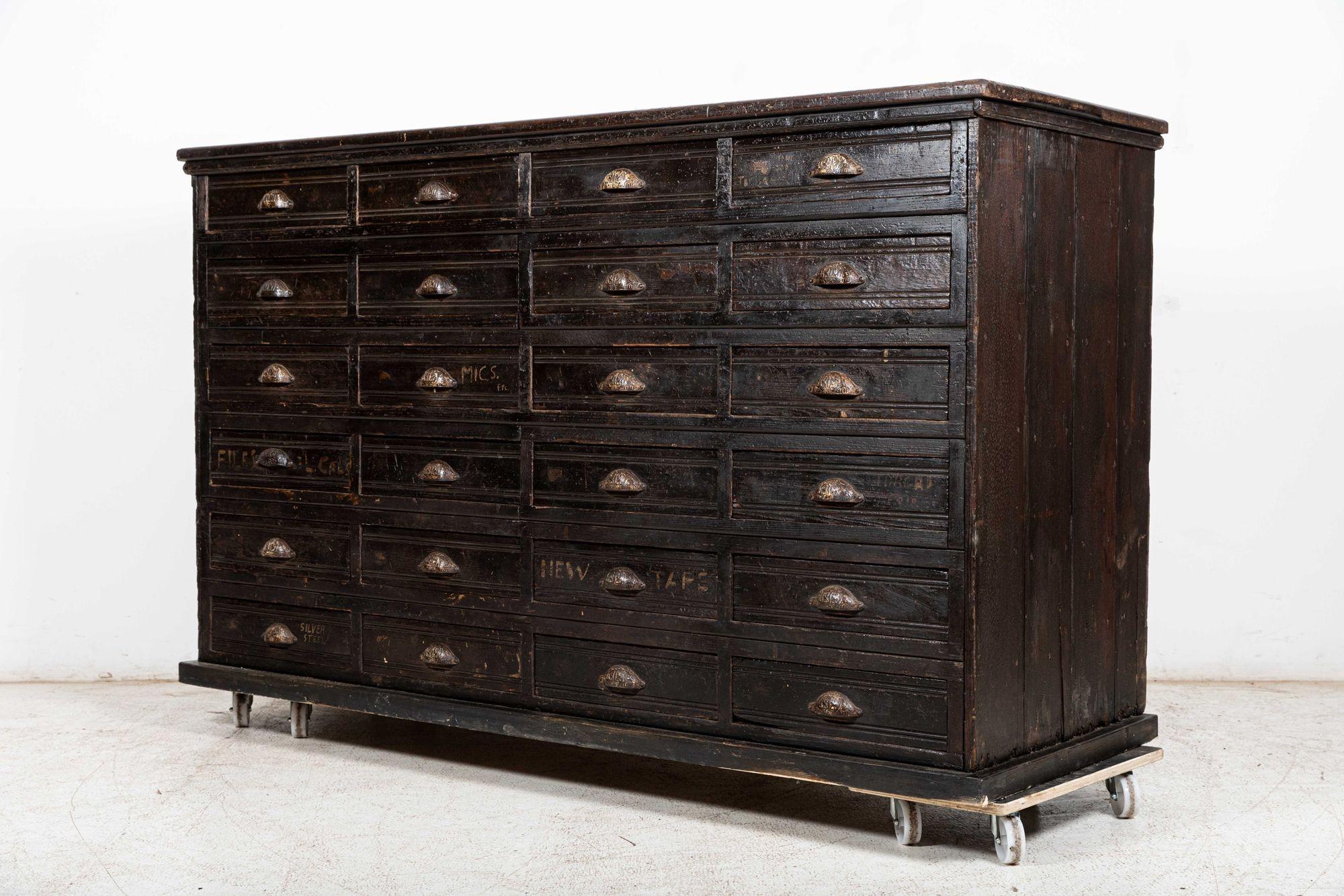 Circa 1890
 
Large 19th C English Engineers ebonised bank of 24 pine drawers.
 
Original hardware and finish.
 
Measures: W 189 x D 68 x H 112 cm.

 