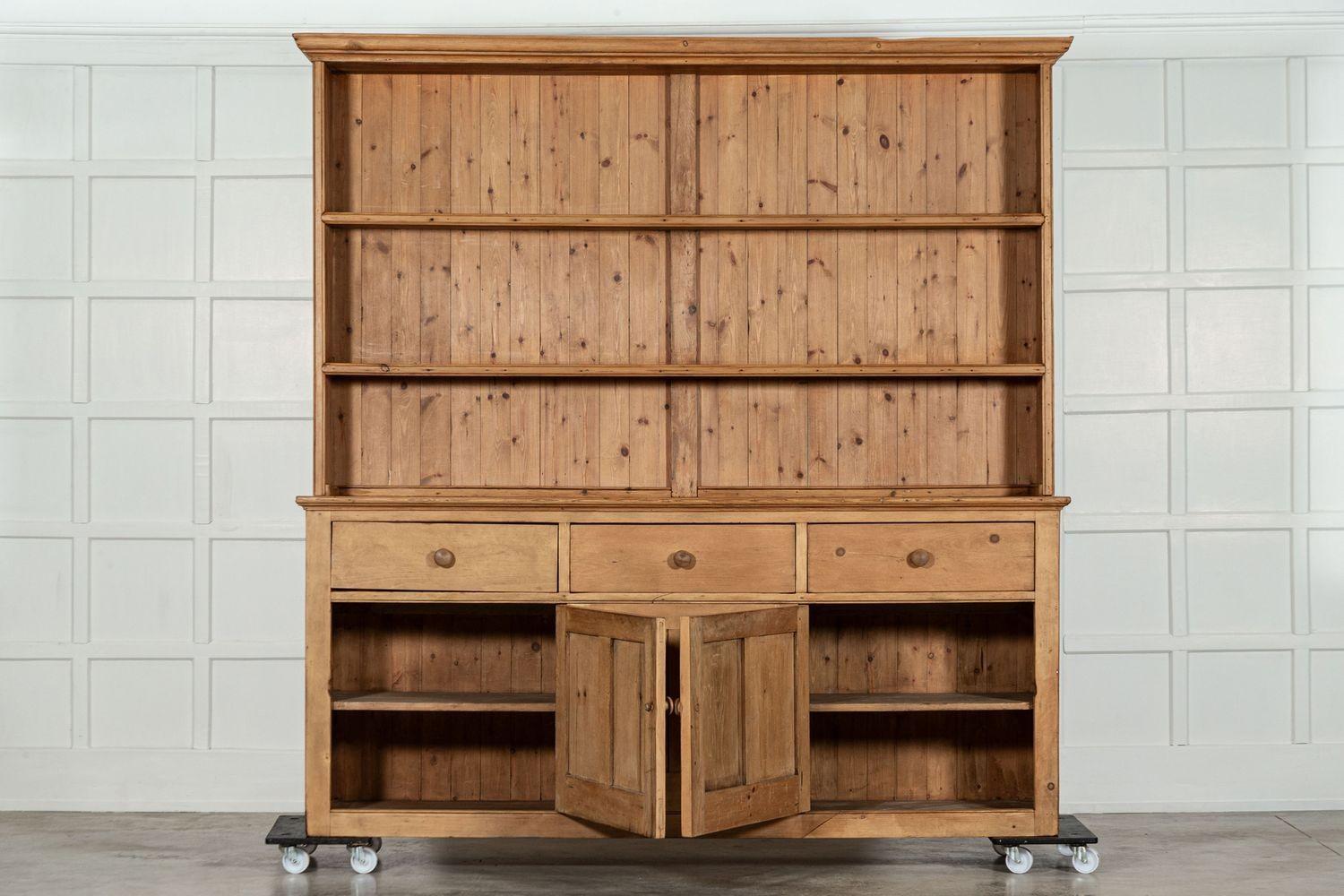 circa 1880
Large 19thC English Pine Dresser
sku 1896
Base W218 x D50 x H97 cm
Top W225 x D29 x H32 cm
Together W218 x D50 x H129 cm
Base Internal shelf depth 42 cm
Top internal shelf depth 22 cm
Weight 115 kg