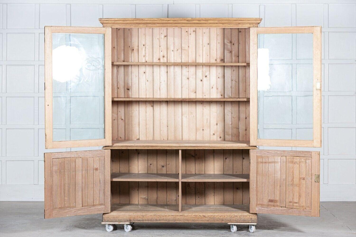 circa 1870
Large 19th C English pine glazed display cabinet / bookcase with key & adjustable shelves.
sku 1216
W164 x D59 x H206cm
Base W157 x D56 x H77cm
Top W164 x D59 x H129cm.