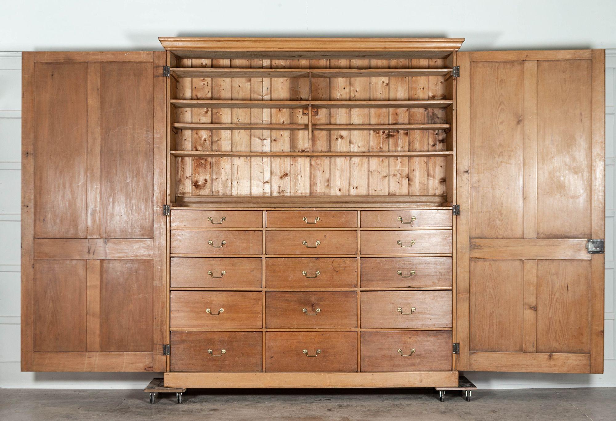 circa 1870
Large 19th century English Pine Linen Press Chest with Graduated Internal Drawers
Breaks down into base, top and doors
sku 1448
Together W224 x D54 x H256 cm
Base W217 x D51 x H133 cm
Top W224 x D54 x H123 cm