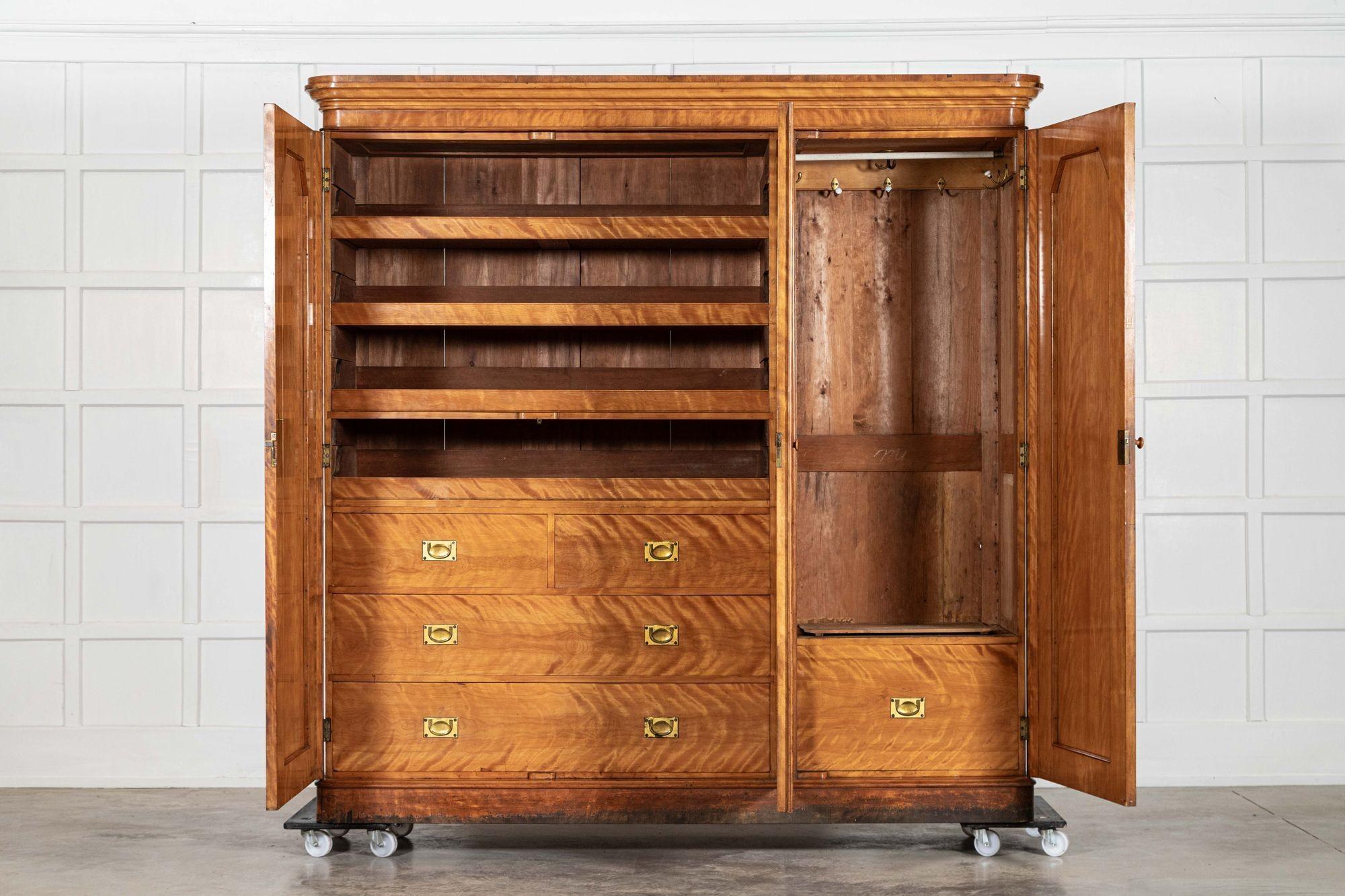 circa 1880
sku 2048
Large 19thC English Satin Birch Compactum Wardrobe

W208 x D61 x H210 cm
Weight 195Kg
SHIPPING DIMENSIONS
cornice W208 x D61 x H15 cm
Plinth W204 x D58 x H12 cm
Right hand side cupboard W70 x D56 x H182 cm
Left hand side cupboard