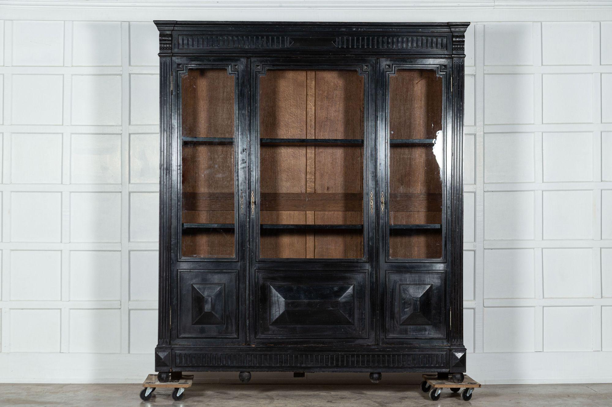 circa 1870
Large 19thC French Ebonised Oak Glazed Bookcase Cabinet

(signs of past woodworm)
W197 x D43 x H226 cm.