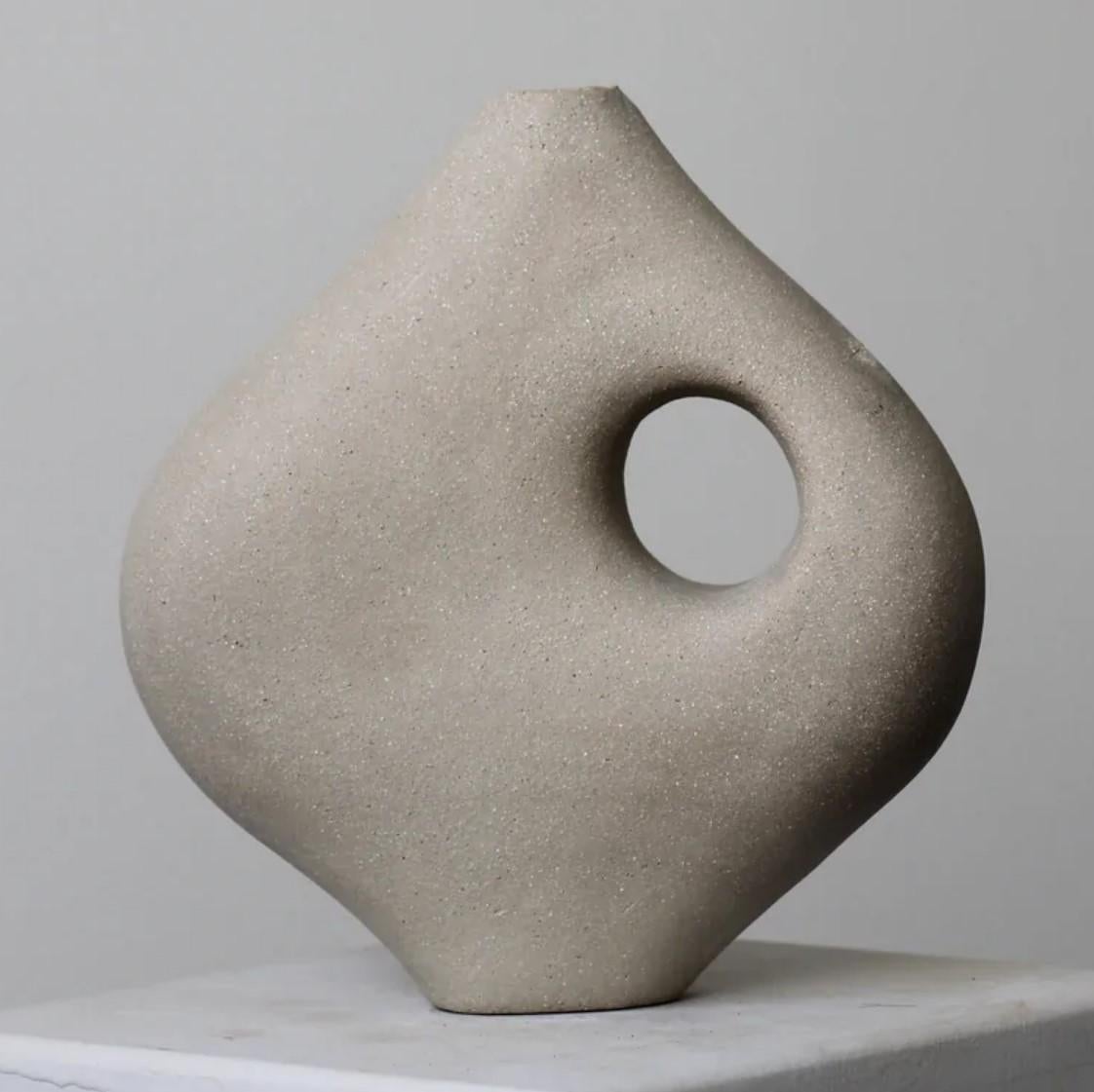 Large 1st Generation Pleomorph 34D Sculpture by Abid Javed
Dimensions: W 30 x D 10 x 40 cm (Dimensions are variable)
Materials: Ceramic stoneware.
Available in multiple clay body and size options.

Ceramic stoneware vessel. Clear-glazed