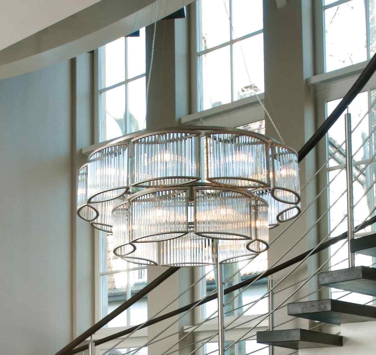 Large Stilio 9/6 two tier pendant chandelier from German manufacturer Licht Im Raum. The chandelier is made up of high quality glass rods placed in oval formed frames of nickel plates steel frames, attached to circular steel ring on each