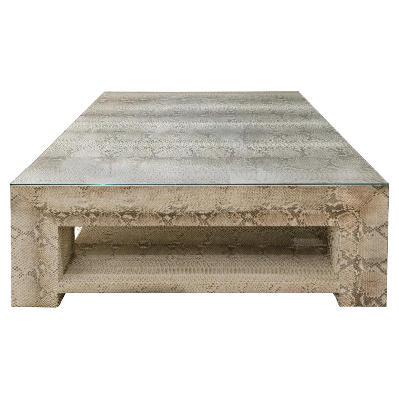 Large 2-tier coffee table in beige python with glass top, custom design, ca 2012