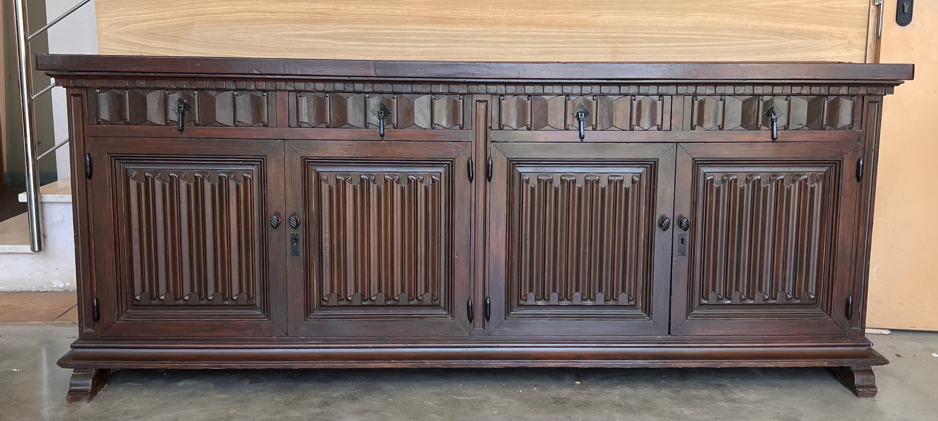 Spanish Colonial Large 20th Century Catalan Spanish Baroque Carved Walnut Tuscan Credenza or Buff For Sale