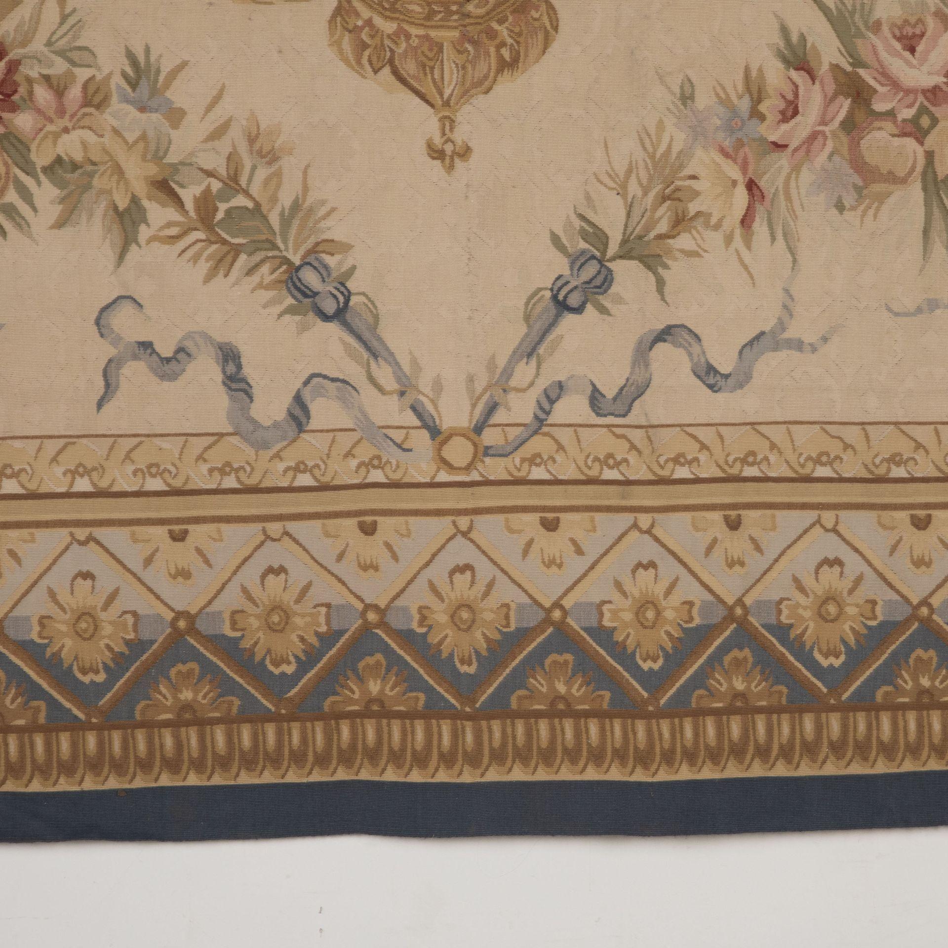 Very large 20th Century French Aubusson carpet featuring a traditional style.
This carpet is very nice being of this size and scale.