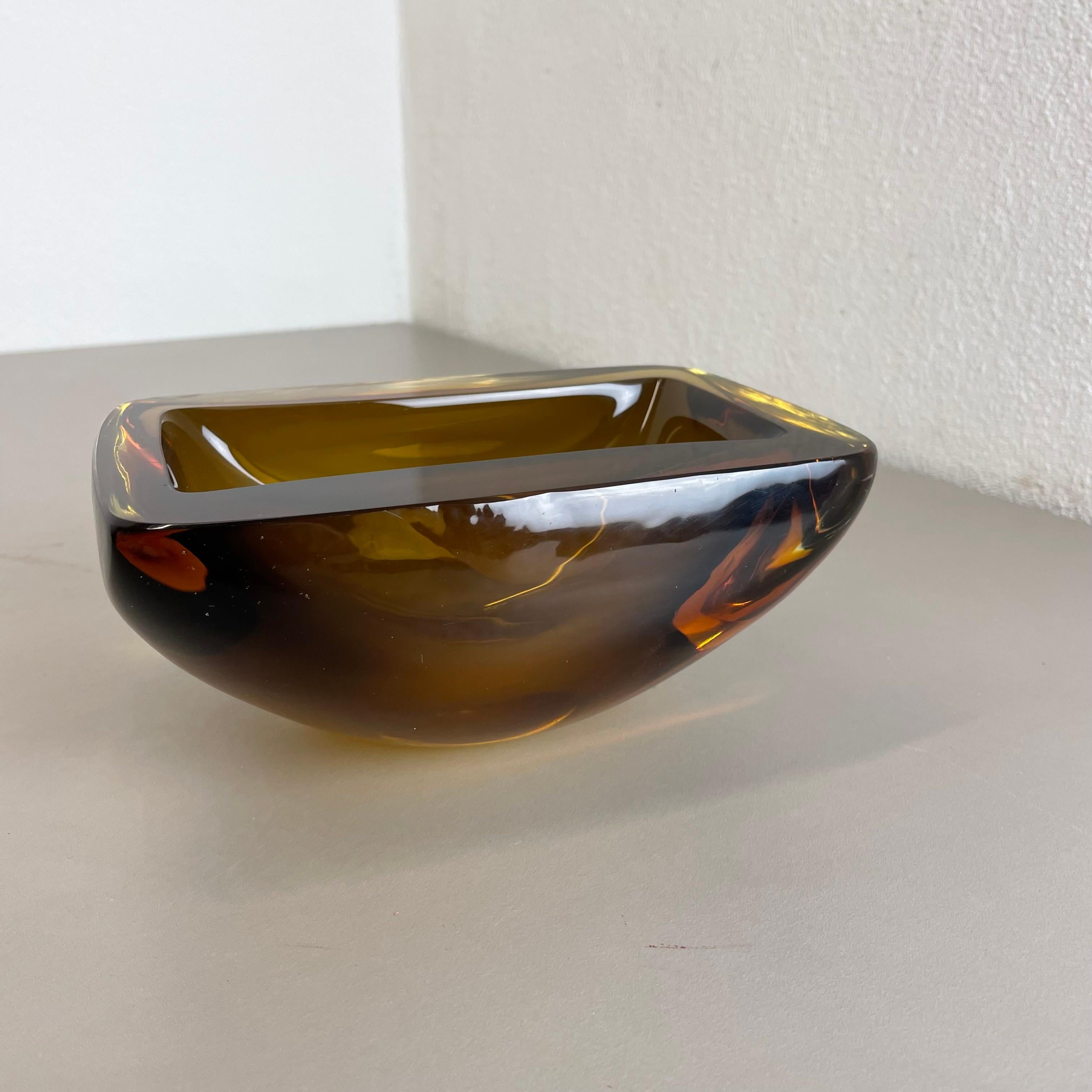 Article:

Murano glass bowl, ashtray element


Origin:

Murano, Italy


Decade:

1970s



This original vintage glass bowl element, ash tray was produced in the 1970s in Murano, Italy. It is made in Sommerso technique and has a fantastic organic