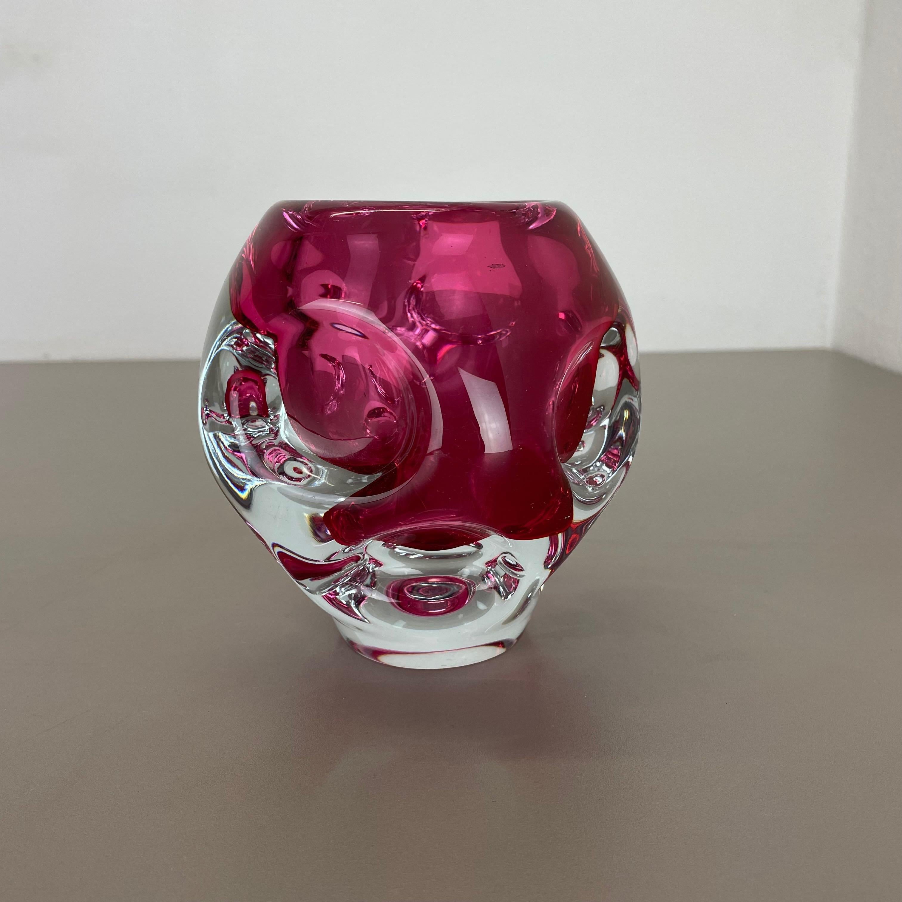 Article:

Murano glass bowl, vase element


Origin:

Murano, Italy


Decade:

1970s



This original vintage glass element was produced in the 1970s in Murano, Italy. It is made of solid haevy glass and has a fantastic organic form.