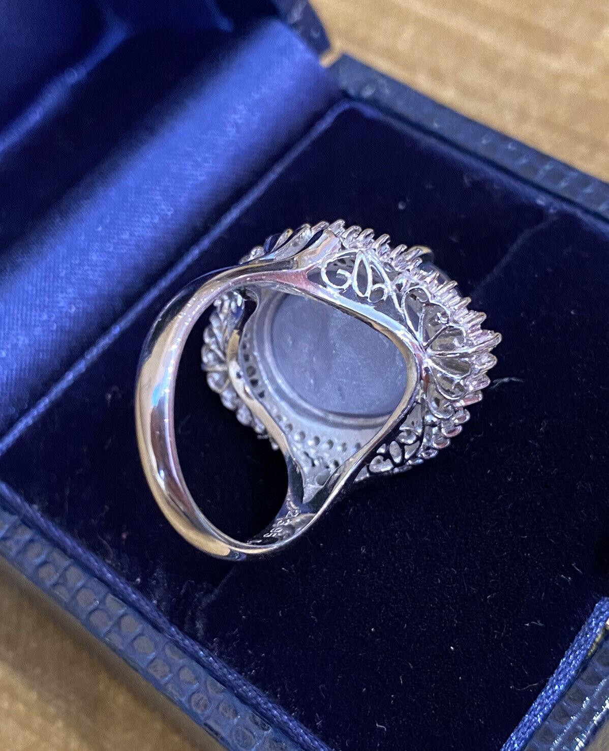 Großer 23,95 Karat ovaler Sternsaphir und Diamant-Ballerina-Ring aus Platin Damen
