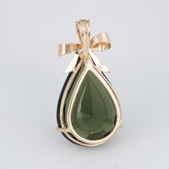 Large 24 Carat Green Tourmaline Pendant Pear Shaped Bow Vintage 14 Karat Gold