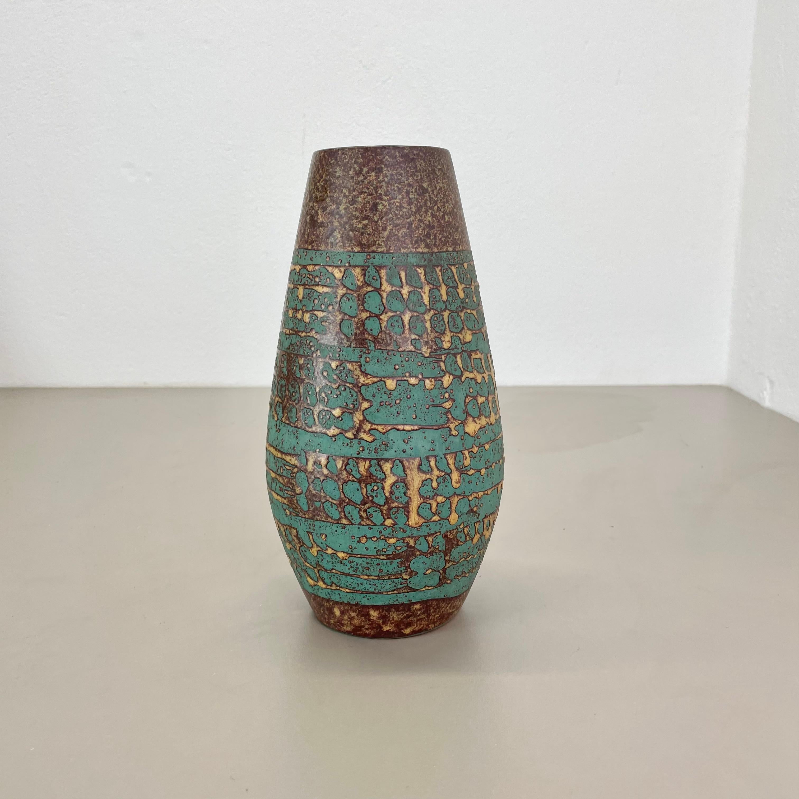 Article:

ceramic pottery vase.


Origin:

Germany.


Producer:

Carstens Tönnieshof, Germany.


Decade:

1970s.


This original vintage pottery object was designed and produced by Cartens Tönnieshof in the 1970s in Germany. It is made of pottery