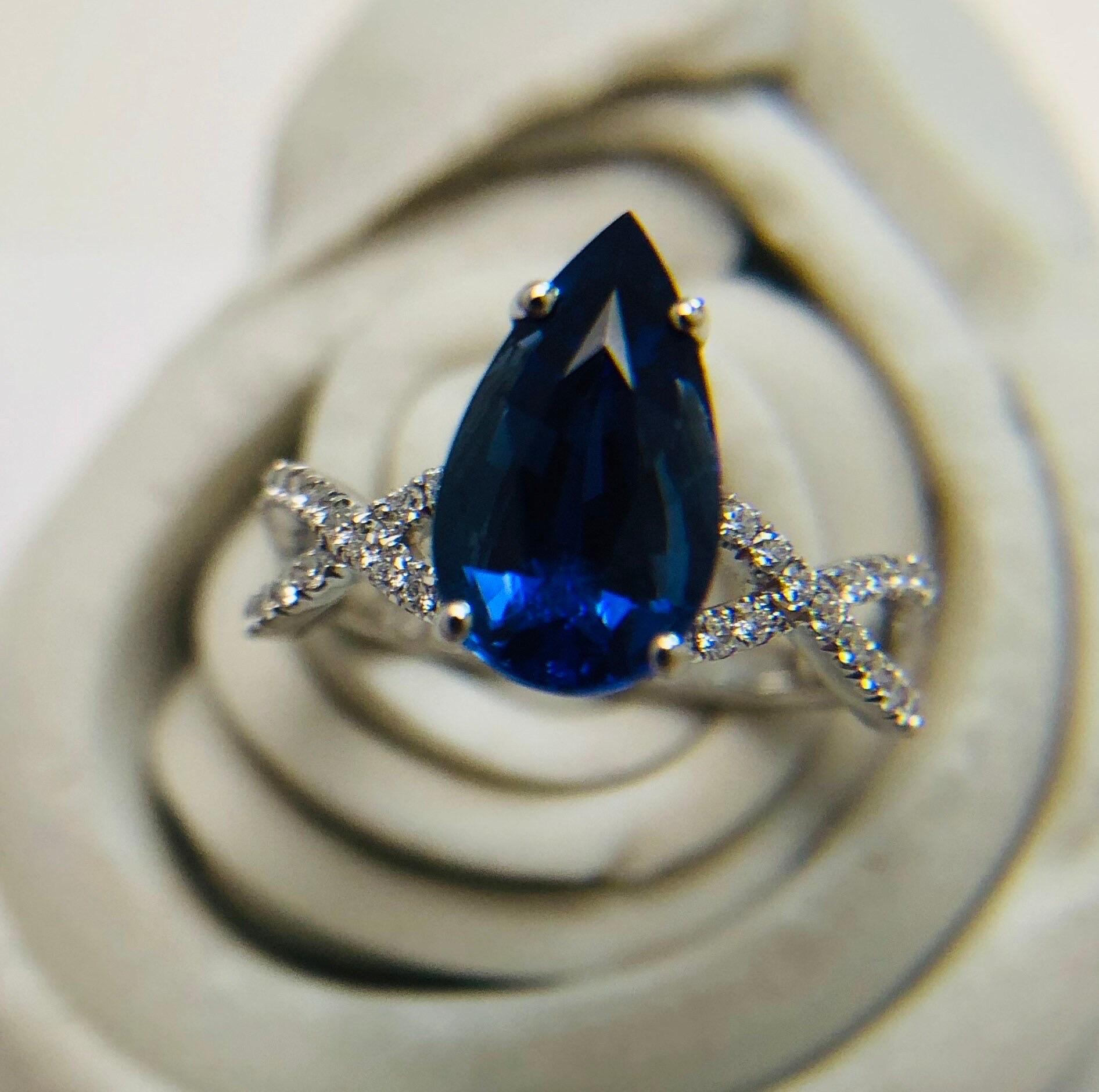 Modern engagement ring made with 2ct pear sapphire gem and natural fine diamonds VS-SI clarity, F-G color made in 18KT white gold.

*Item will come with a beautiful packaging and certificate of authenticity from laboratory in your name. 

**All