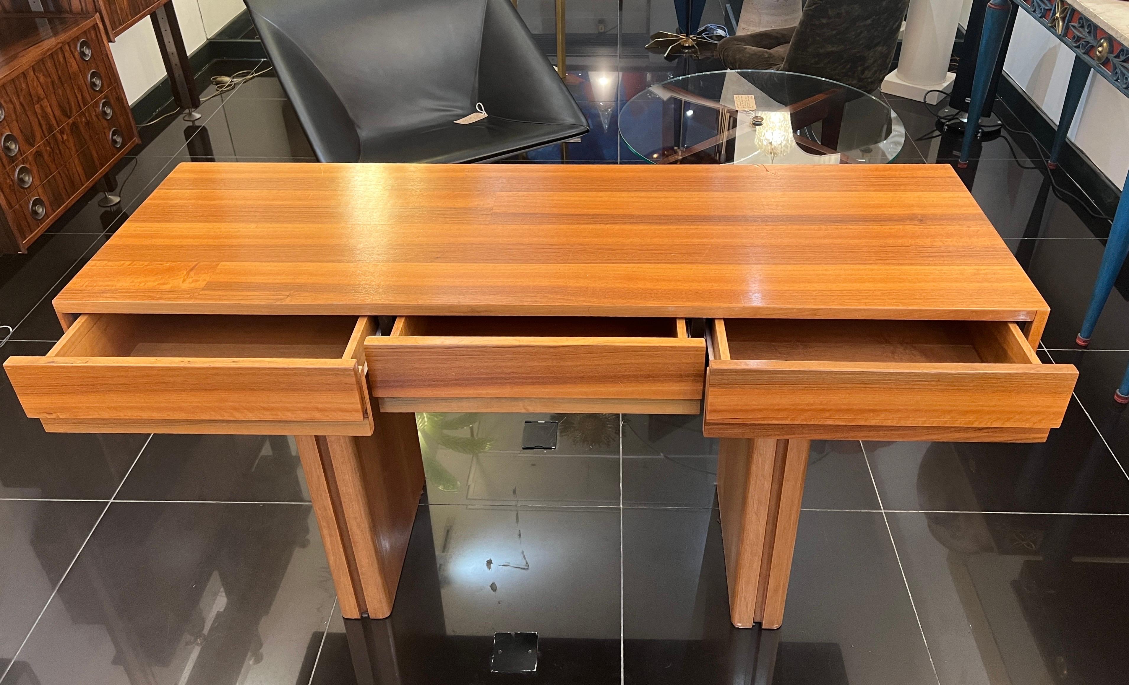 A large architectural design freestanding console table in cherrywood with 3 drawers . Beautifully made with linear details, a very solid piece that can be used also as a desk or a table . Made in Italy C1980 . 