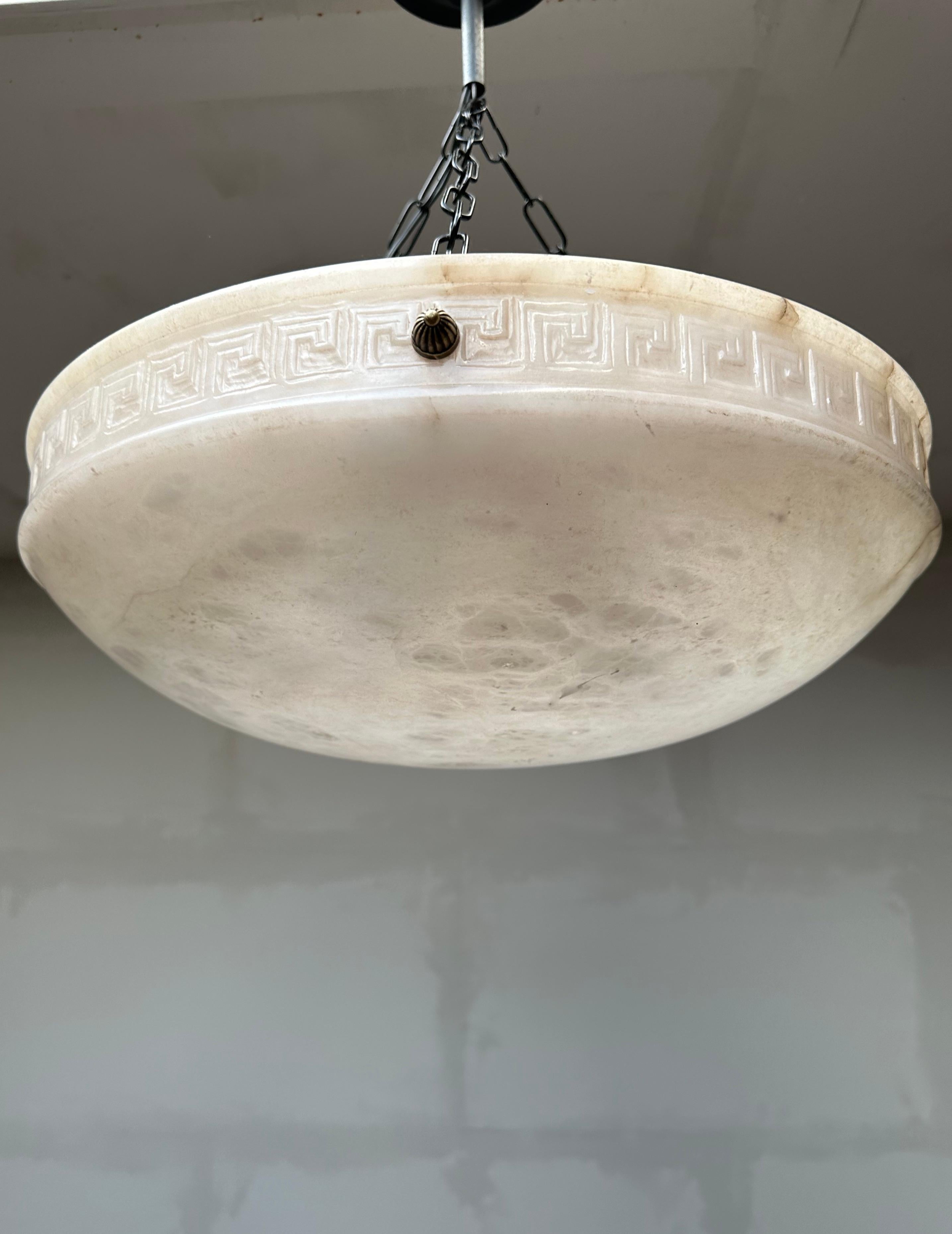 Rare and majestic, three light white alabaster pendant.

This large size flush mount comes with a stunning design and perfectly polished alabaster shade. This beautifully balanced alabaster light fixture is designed in such a way that the three