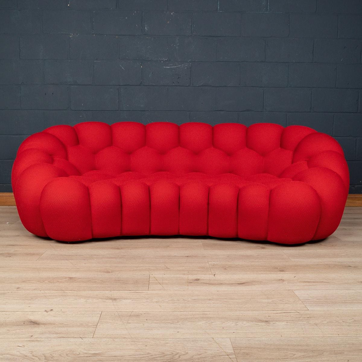 A beautiful curved “Bubble“ sofa by Roche Bobois. Created by Sacha Lakic, a designer with a passion for cutting-edge technology, Bubble expresses the balance between innovation, function and emotion. Inspired by natural and mineral forms and