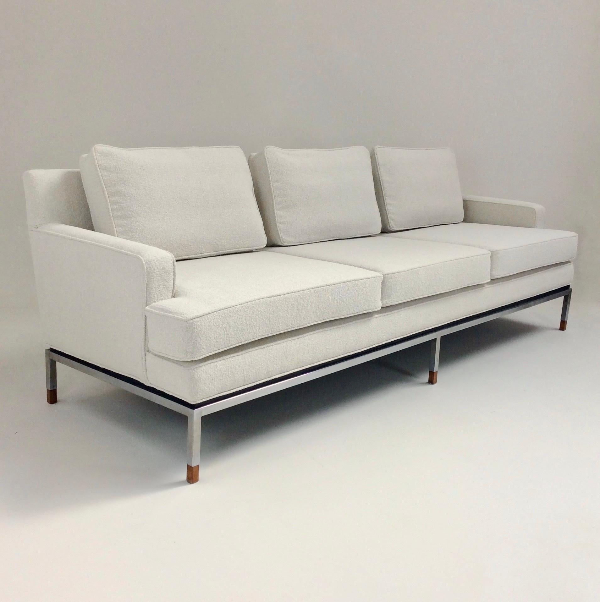Large 3 seats sofa, Dunbar Edition, circa 1970, United States.
New upholstery, off white mix bouclé fabric, steel base and feet with wood details.
Dimensions: 232 cm W, 75 cm H, 85 cm D, 48 cm seat height.
All purchases are covered by our Buyer