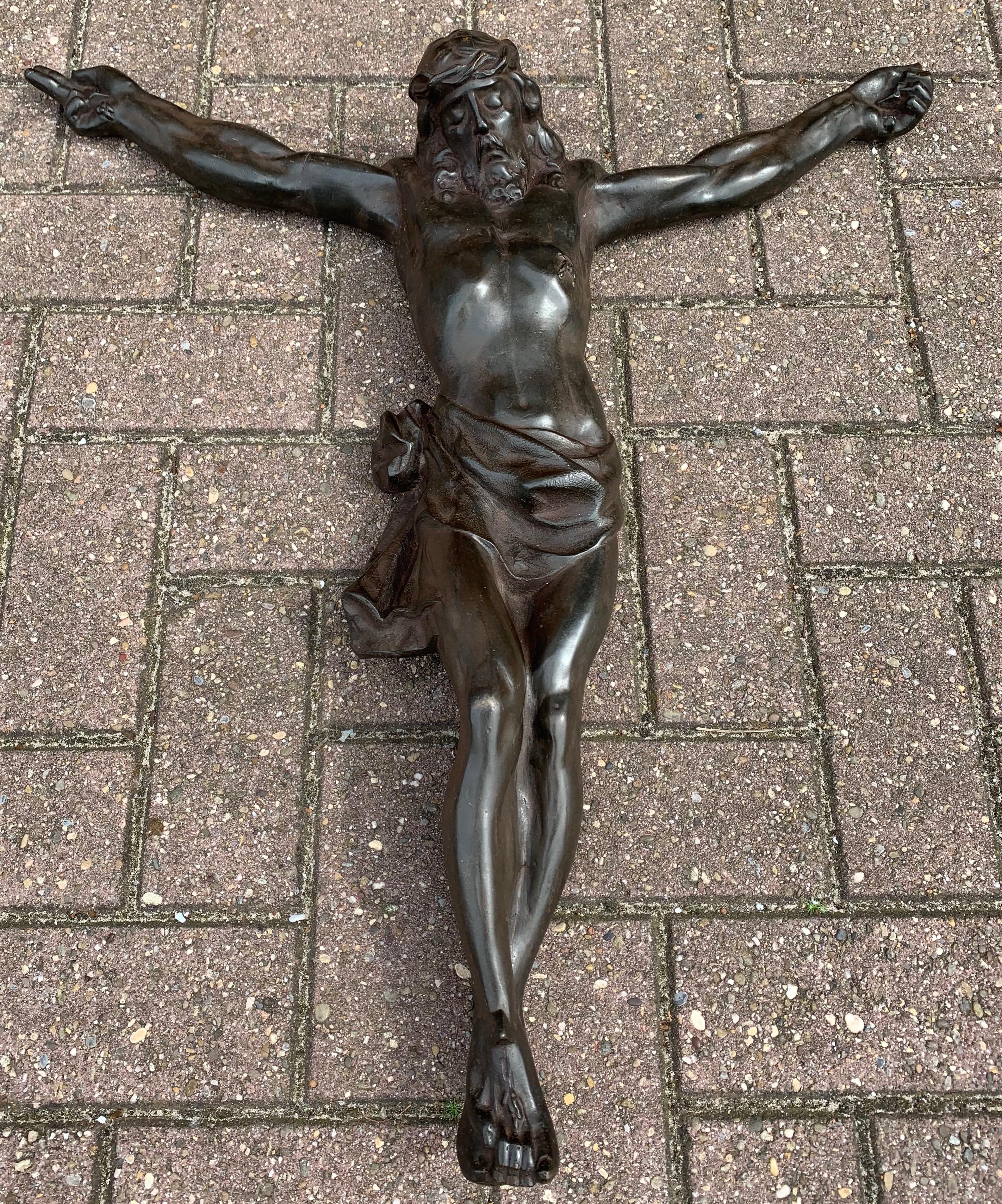 Stunning and beautifully handcrafted, work of religious art.

Large bronze crucifixes are a rare find and to have been given the opportunity to purchase one of such beautiful quality and details more than made our day. The striking anatomy and the