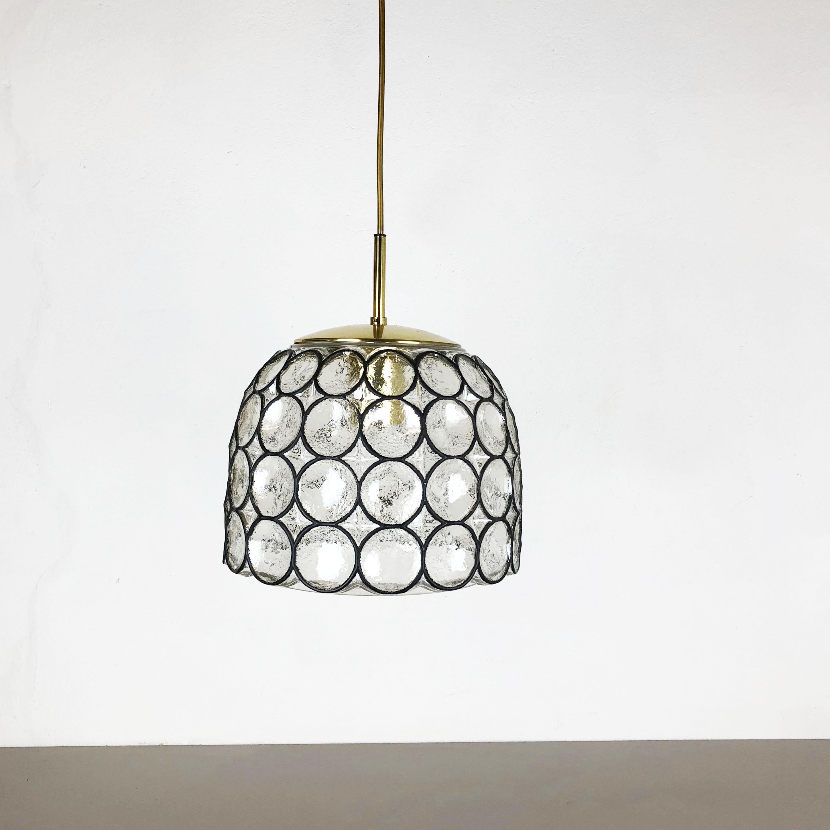 Article:

hanging light extra large


Producer:

Glashütte Limburg, Germany



Origin:

Germany



Age:

1970s



Original 1970s modernist German Hanging Light made of high quality glass with black ring within the glass. the light is part of the so