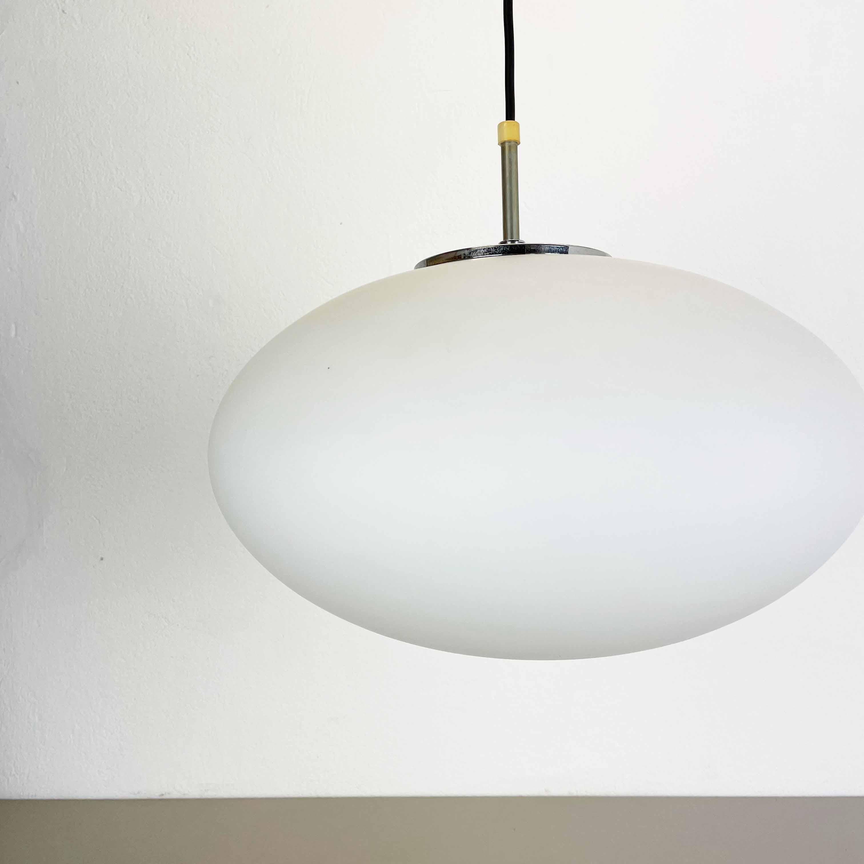 White UFO Opal Glass Hanging Light by Peill and Putzler, Germany, 1970s In Good Condition For Sale In Kirchlengern, DE