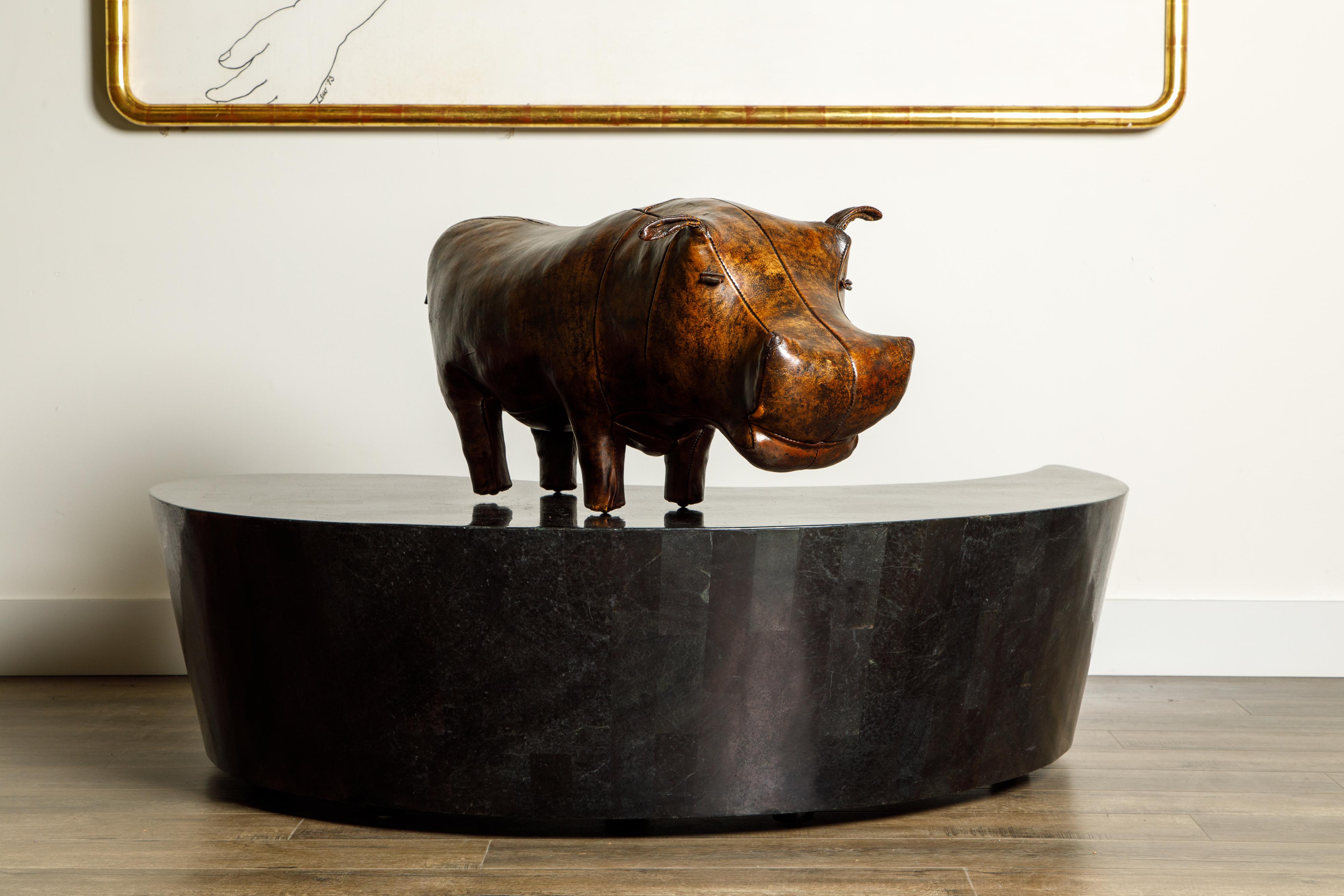 A wonderful collectors A&F signed example of the original Hippopotamus footstool by Dimitri Omersa for Abercrombie and Fitch, circa 1970 in beautiful deep and dark waxed patina leather finish throughout. This example is signed with the A&F logo