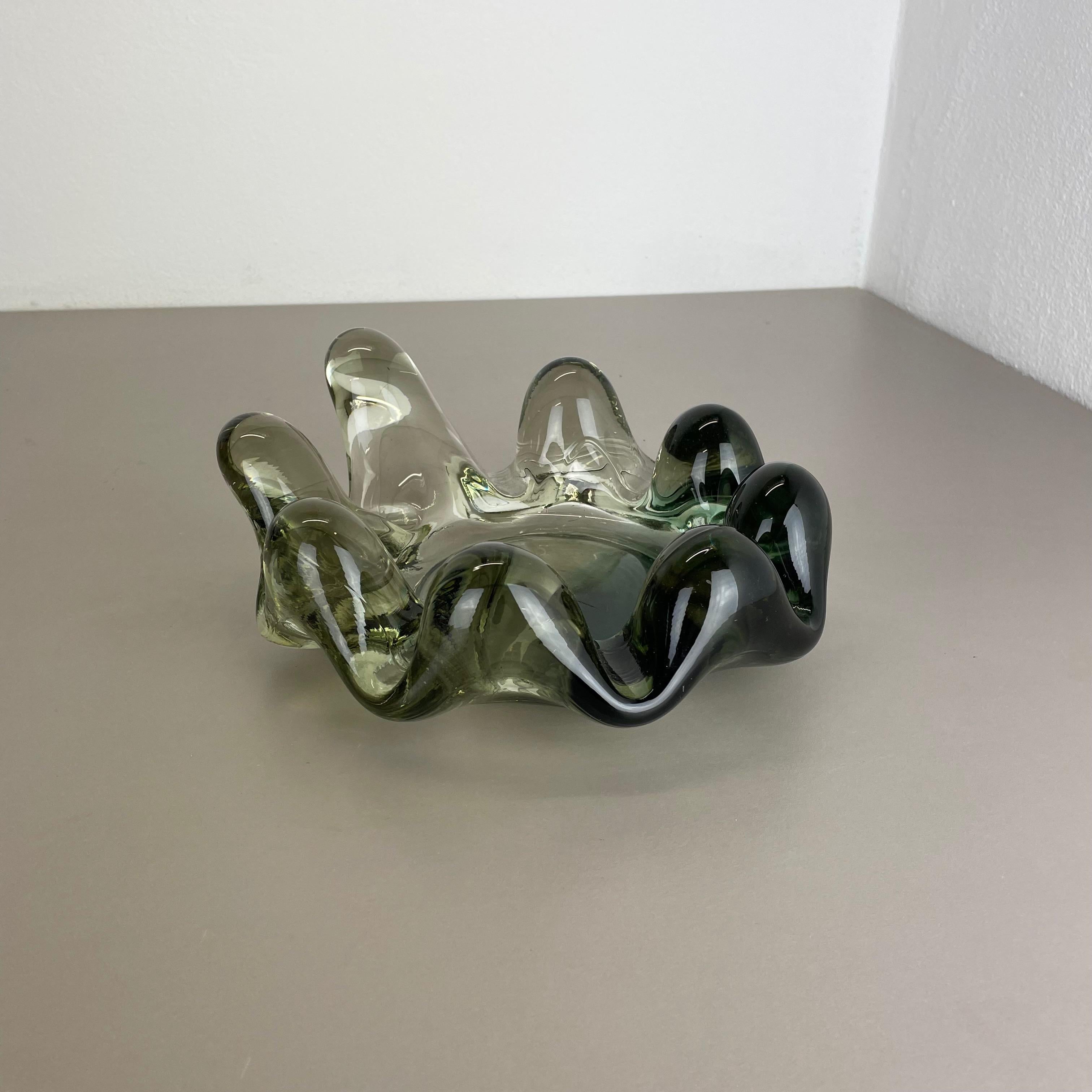 Article:

glass bowl shell element


Origin:

France


Decade:

1970s



This original vintage glass bowl element was produced in the 1970s in France. It is made of solid very heavy and has a fantastic brutalist organic form. The