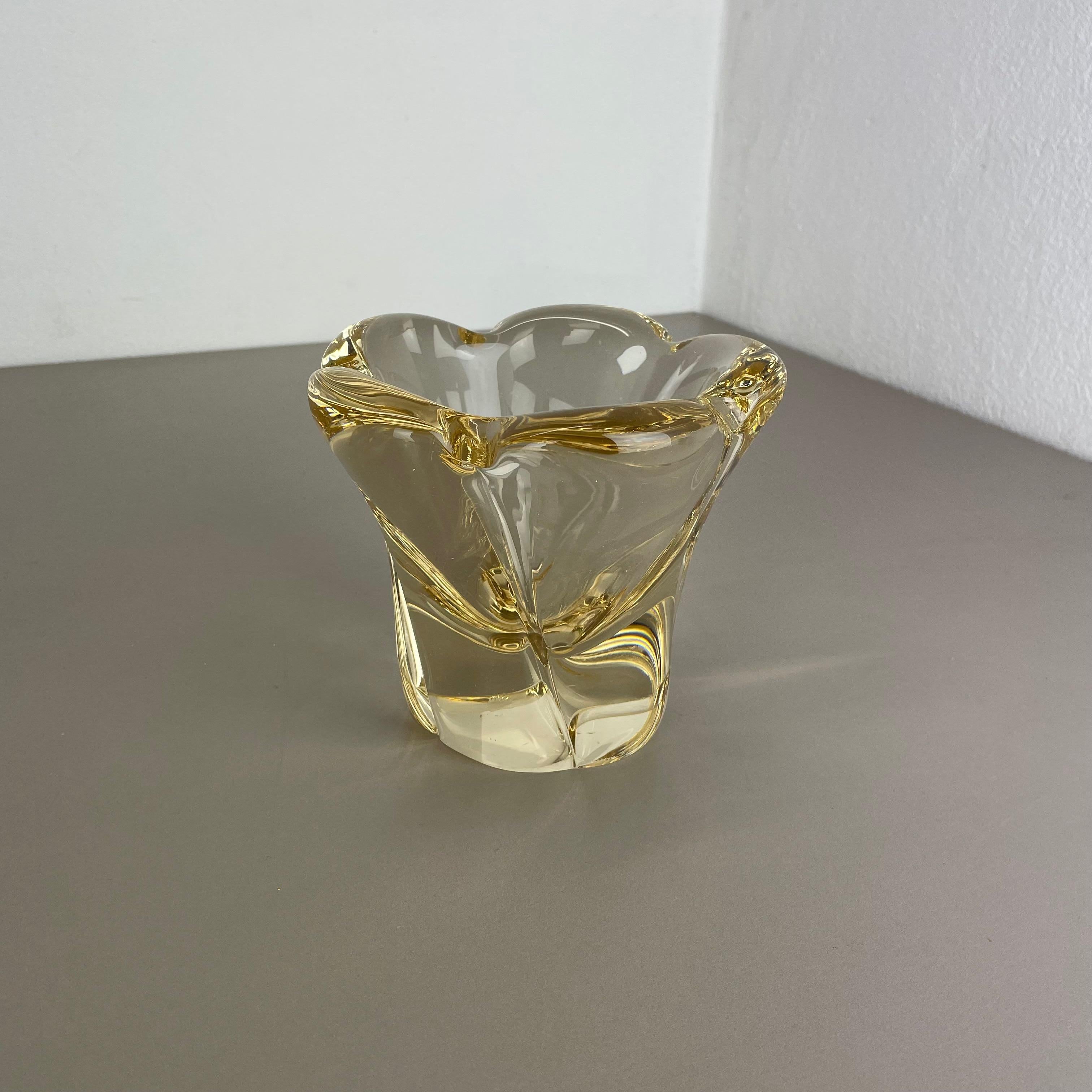 Article: Crystal glass vase bowl 



Producer: Daum Nancy FRANCE (marked)



Age: 1970s



 

Wonderful heavy glass element designed and produced by DAUM in France in the 1970s. This glass bowl is high quality French production, made of crystal