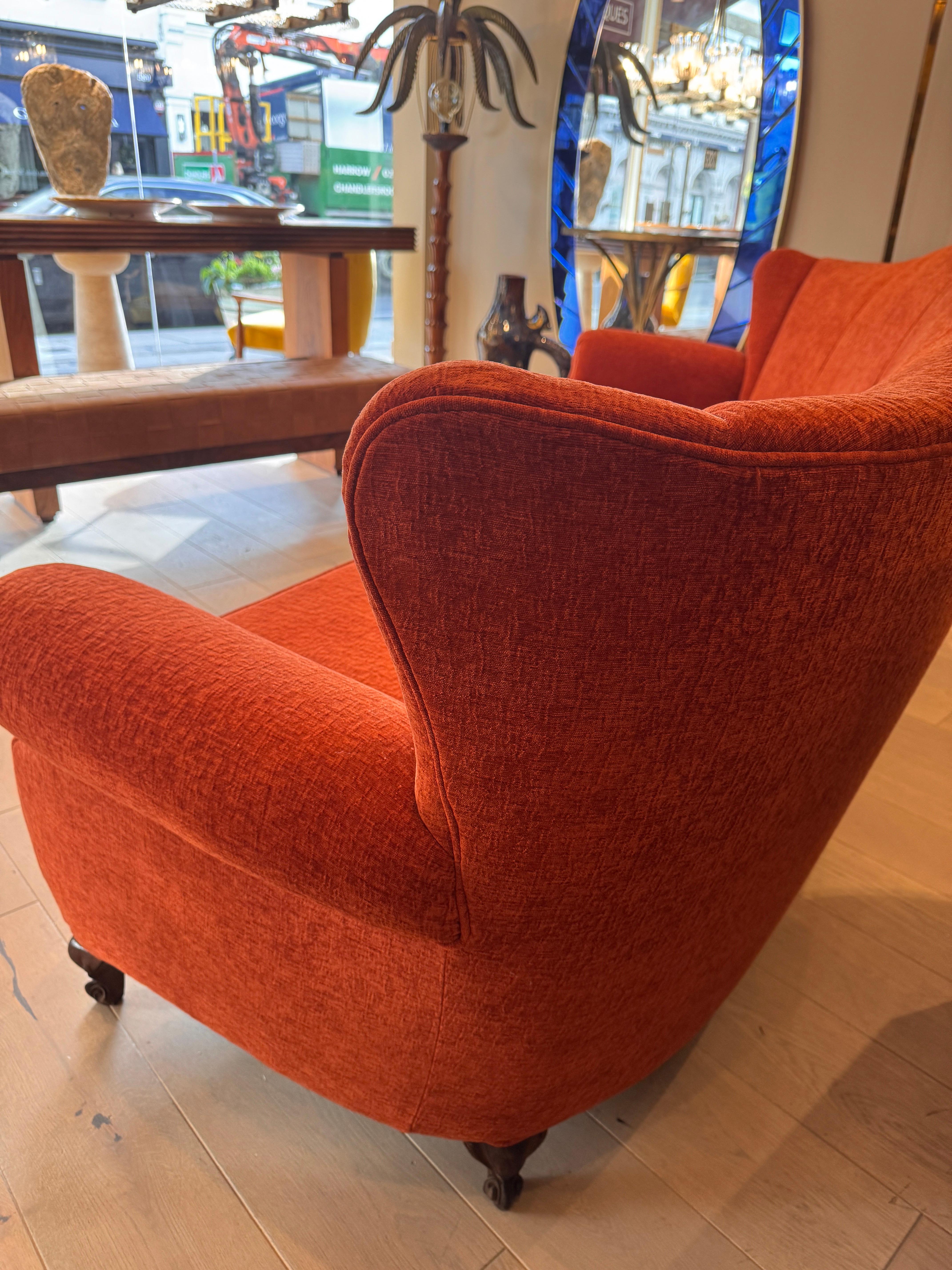 Italian Large 4 seater semi circular wingback sofa in lush orange velvet For Sale