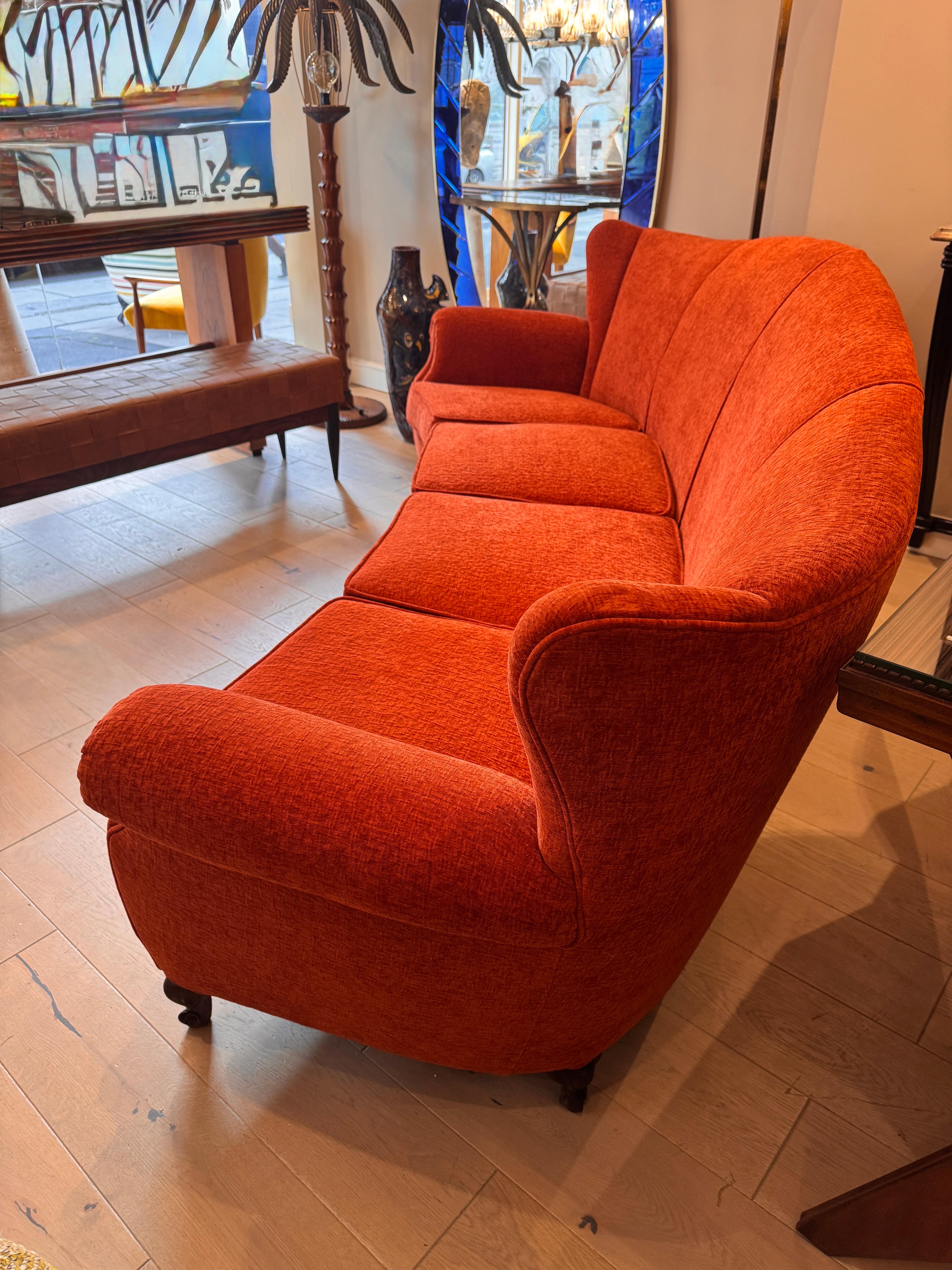 20th Century Large 4 seater semi circular wingback sofa in lush orange velvet For Sale