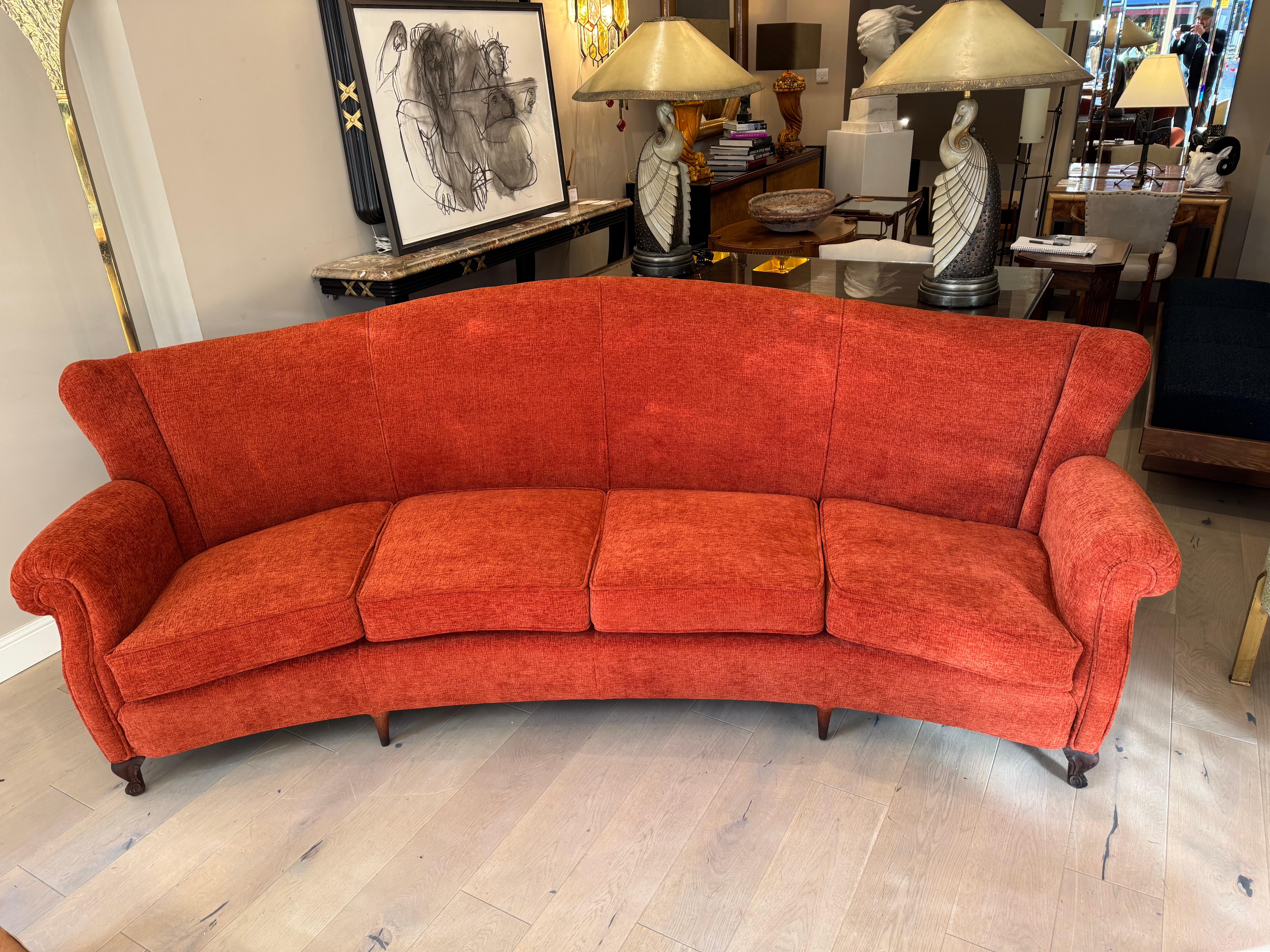 Velvet Large 4 seater semi circular wingback sofa in lush orange velvet For Sale