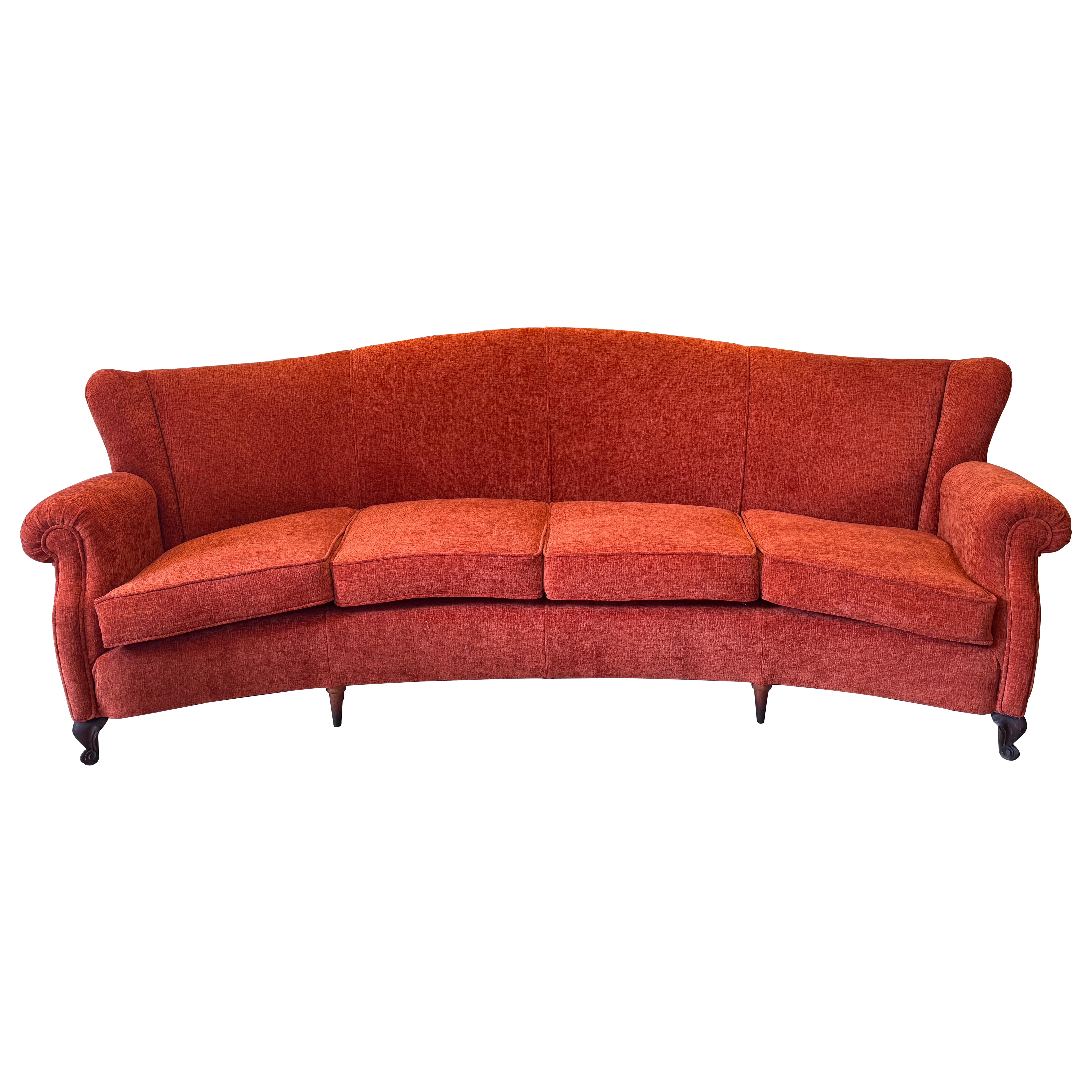 Large 4 seater semi circular wingback sofa in lush orange velvet For Sale