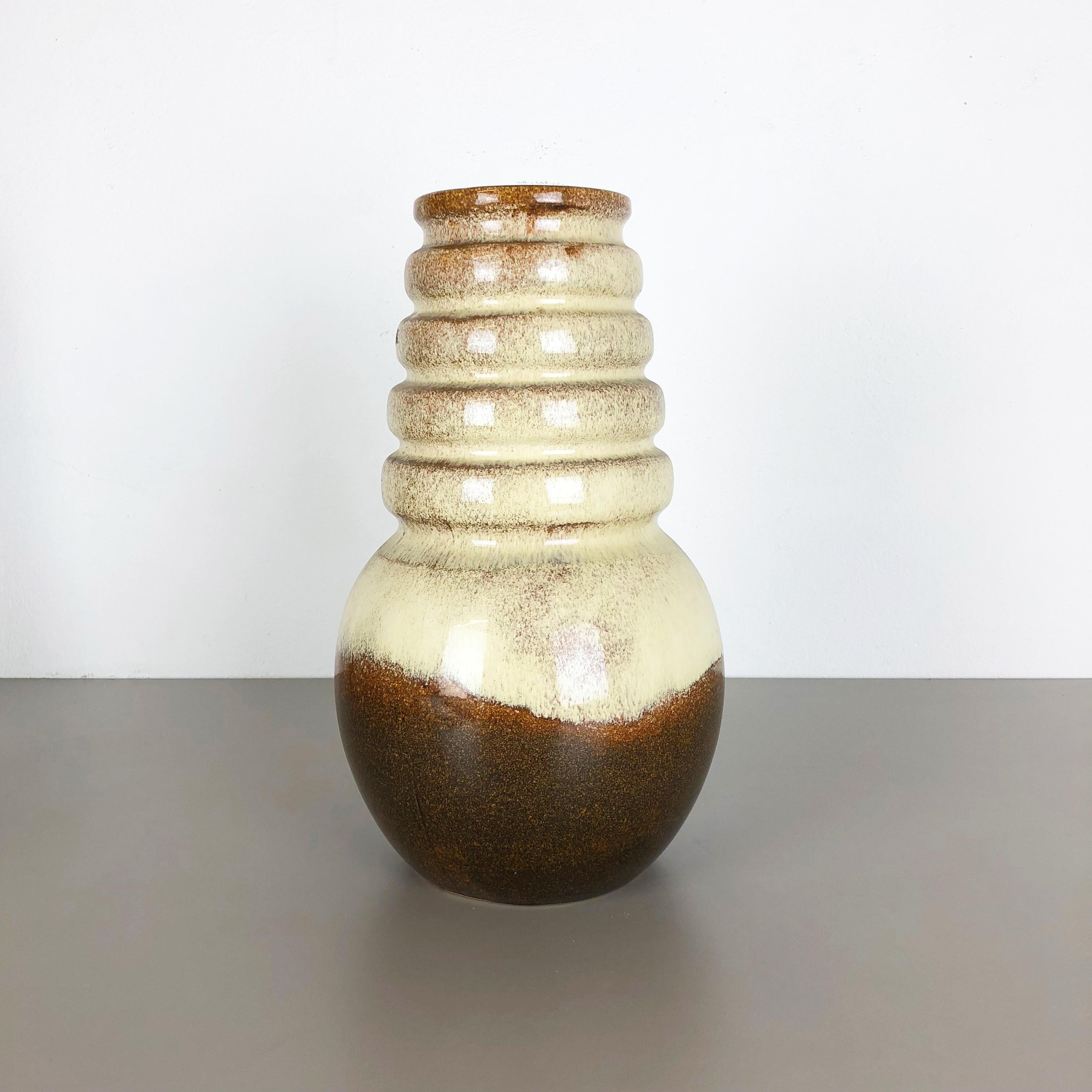 Article:

Fat lava art vase


Model: Vienna


Producer:

Scheurich, Germany



Decade:

1970s


Description:

This original vintage vase was produced in the 1970s in Germany. it is made of ceramic pottery in fat lava optic. Super rare in this