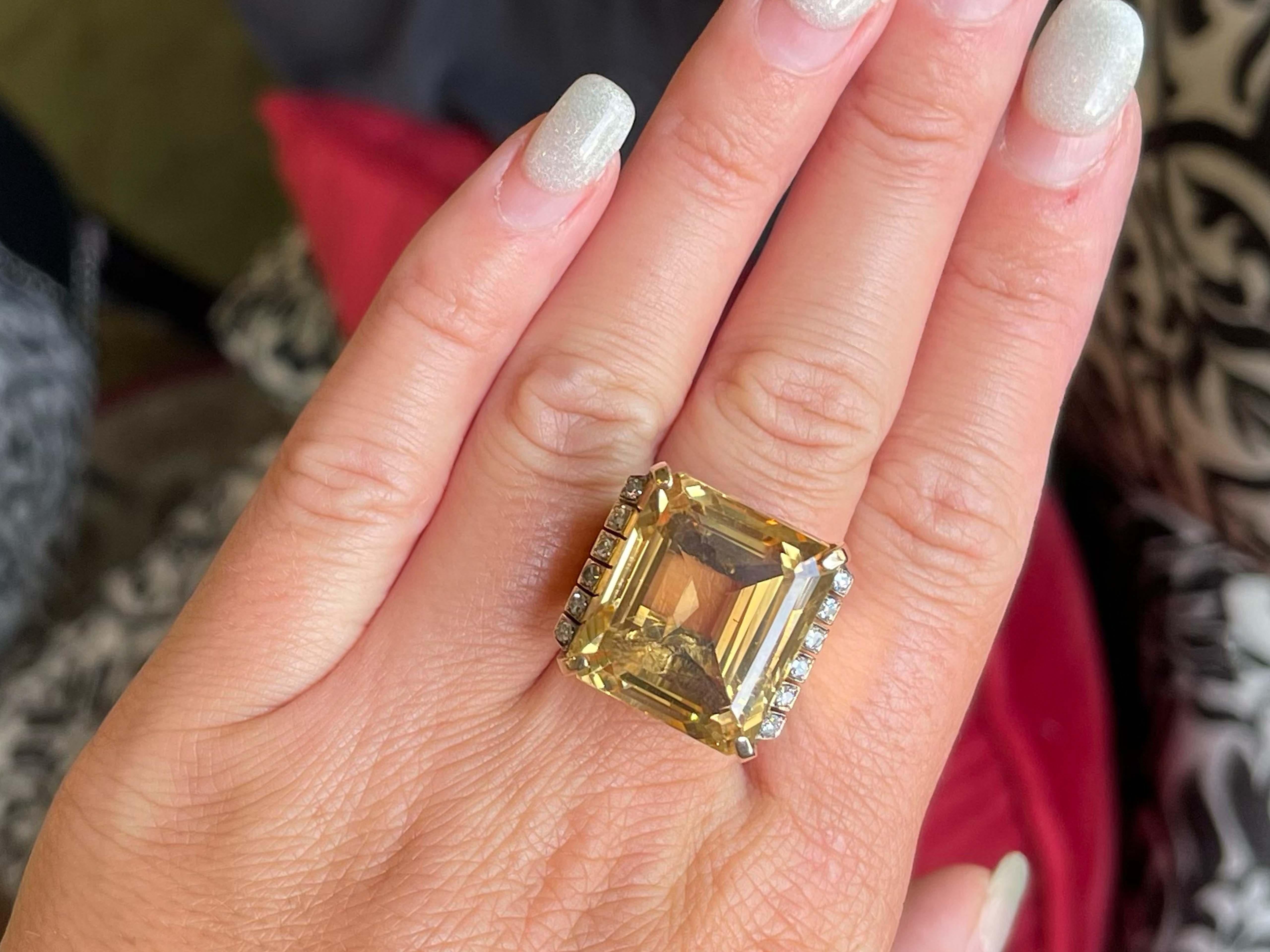 Item Specifications:

Metal: 14k Yellow Gold

​Ring Size: 7

Ring Weight: 23.0 grams

Gemstone Specifications:

Gemstone: Yellow Topaz

Topaz Measurements: 20.14 mm x 17.03 mm x 14.34

Topaz Carat Weight: ~43.50 Carats

Color: Yellow Brown

Shape: