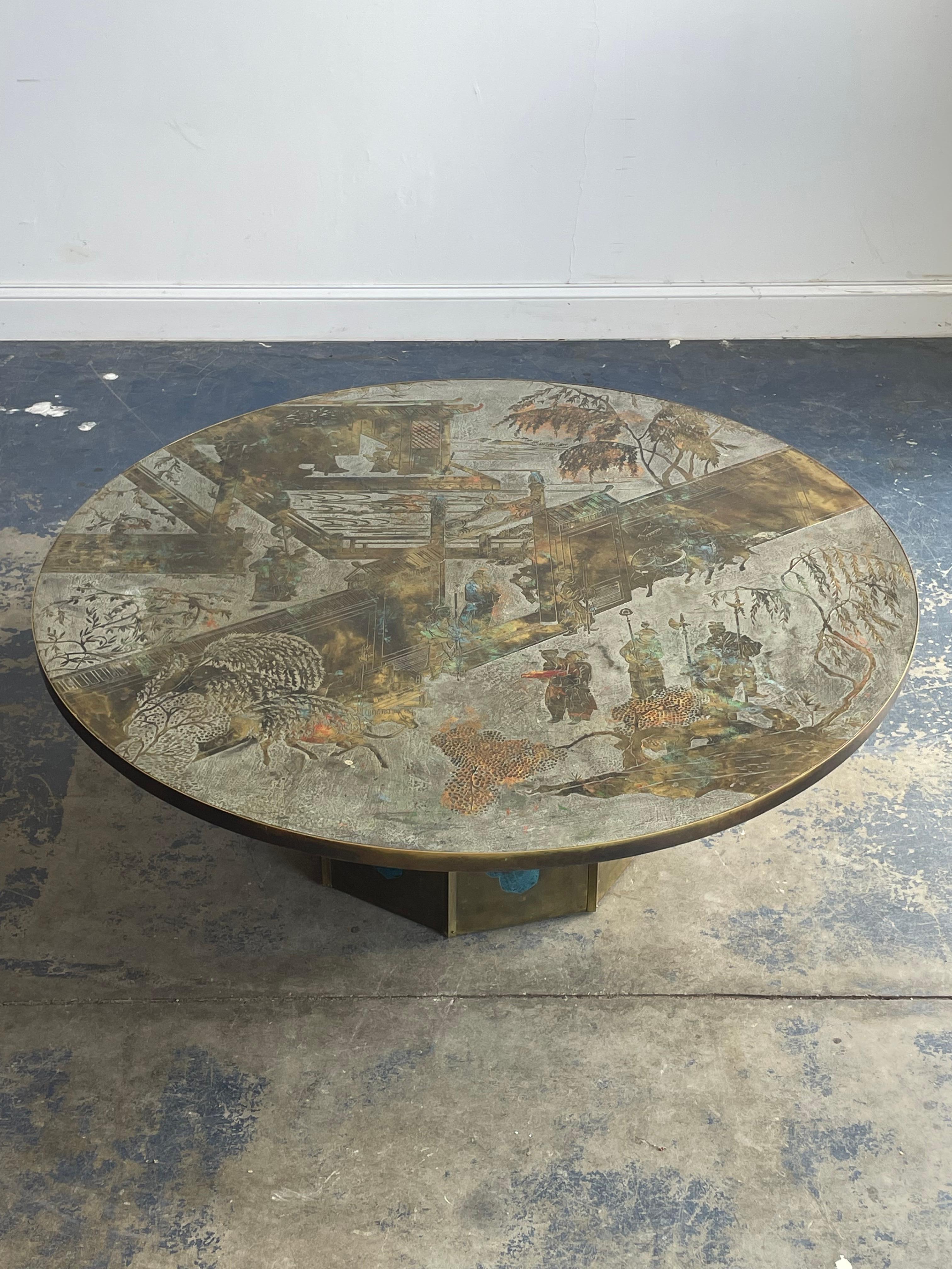 A wonderful “Chan” coffee table designed by Philip and Kelvin LaVerne in the less common 47.5” diameter. These tables are beautiful in every sense of the word with their motifs alongside bronze and pewter construction. Great size and composition.