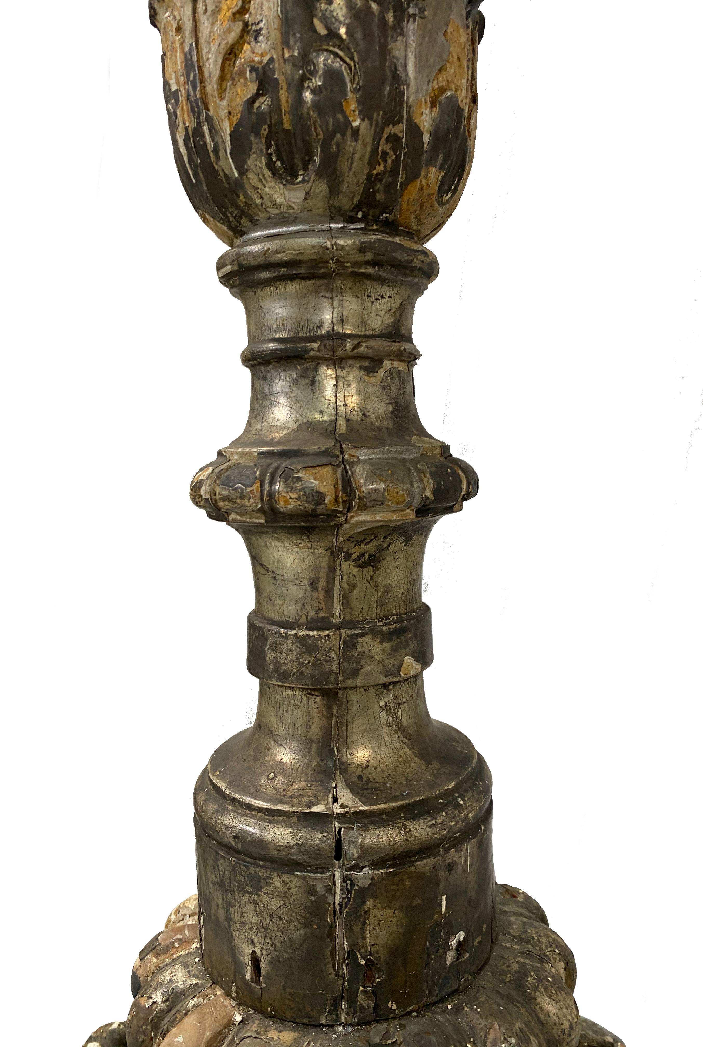 Stately and tall 17th century Italian silver leaf altar sticks/torcheres/candlesticks/. The age and patina on these is absolutely stunning. Measuring just over 5 feet.