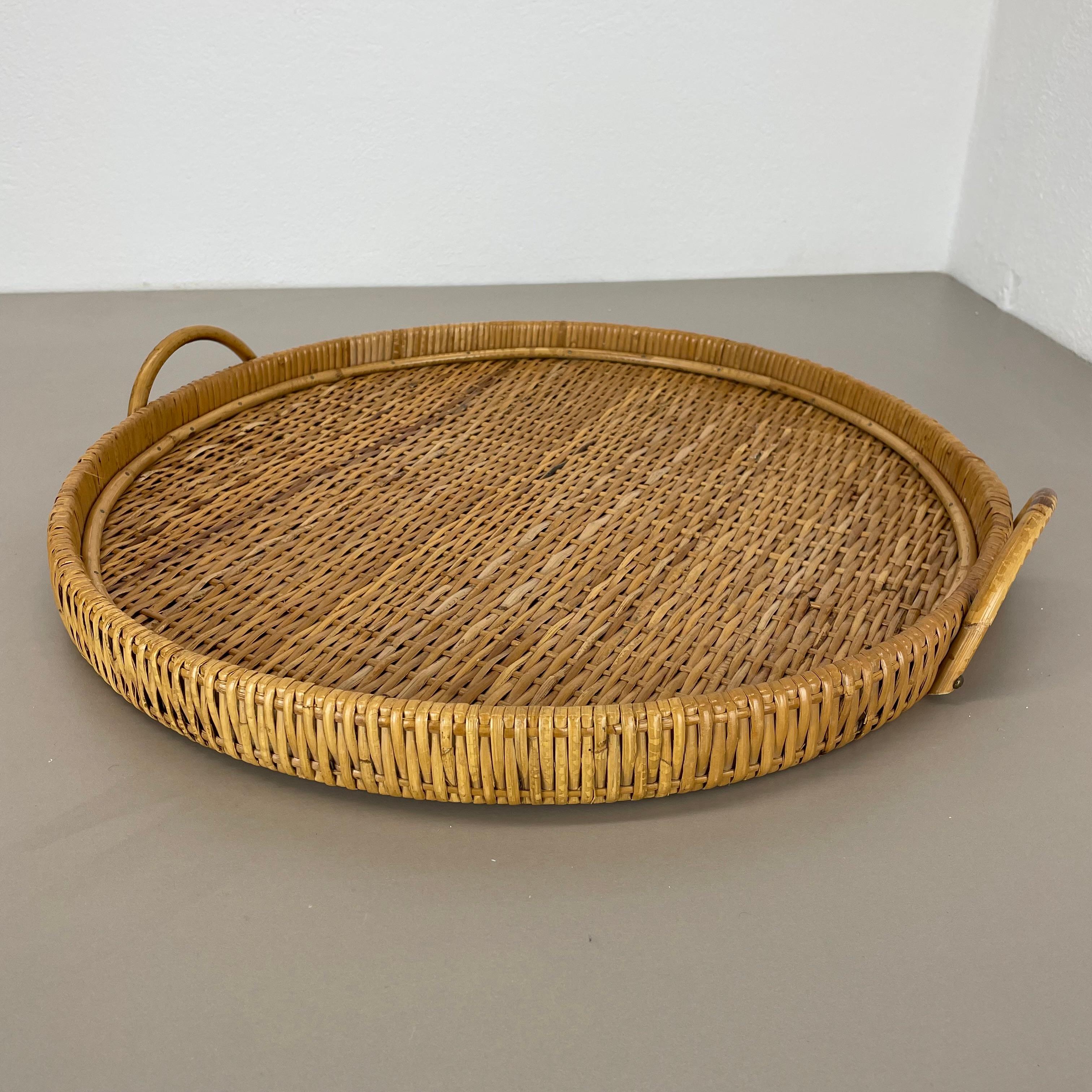 Article:

tray element


Origin:

Italy


Design:

In style of Franco Albini and Gabriella Crespi



Age:

1970s


Description:

This original vintage tray element was designed and produced in the 1970s by in Italy. the tray is made of rattan and