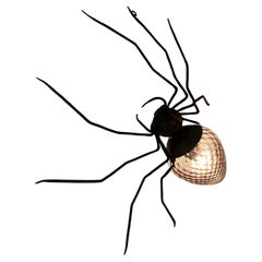 Gran lámpara en forma de araña de los años 50 "Amuleto de la suerte" de hierro cobre y cristal cincelado
