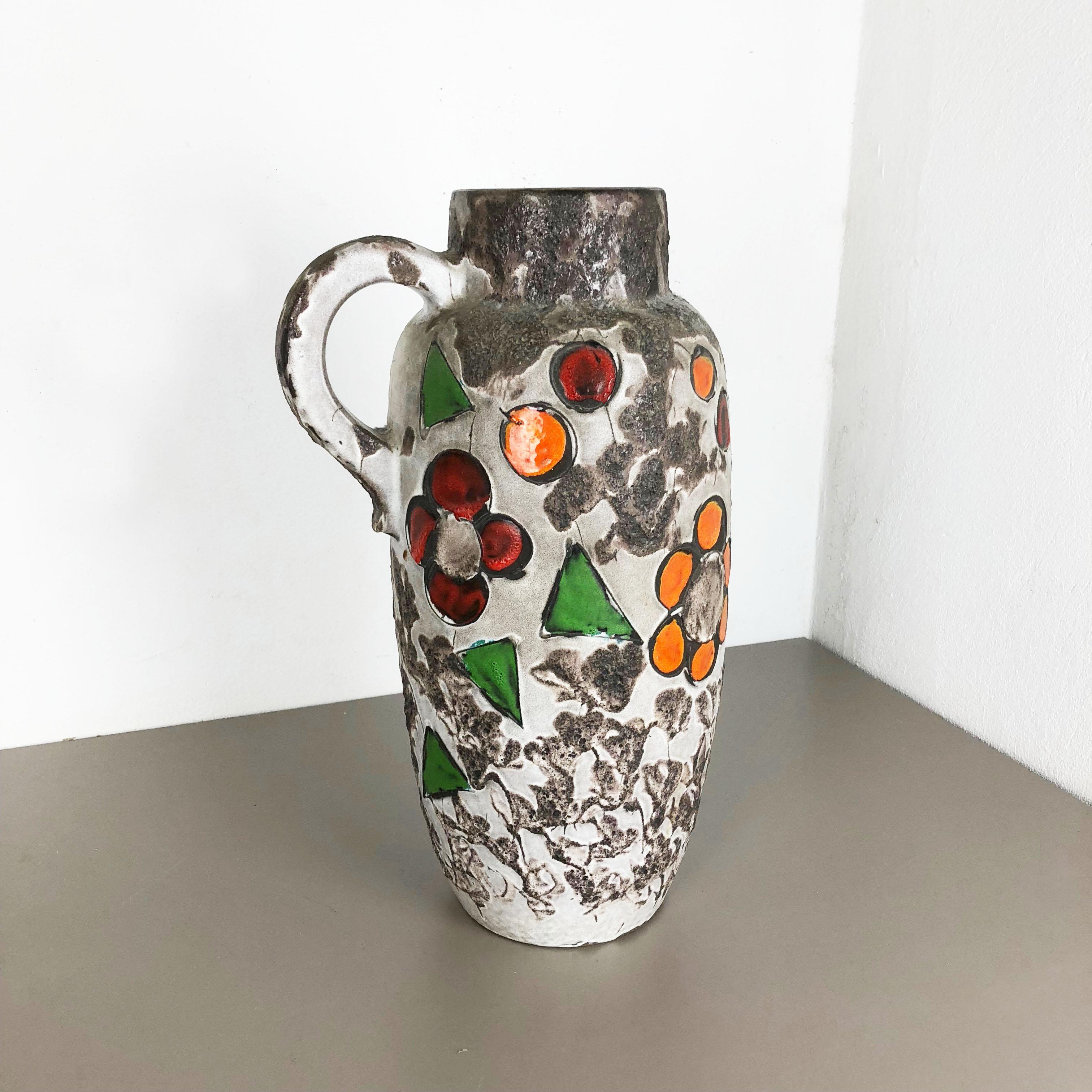 Article:

Fat lava art vase xxxl version


Model: 420-54


Producer:

Scheurich, Germany



Decade:

1970s


Description:

This original vintage vase was produced in the 1970s in Germany. it is made of ceramic pottery in fat