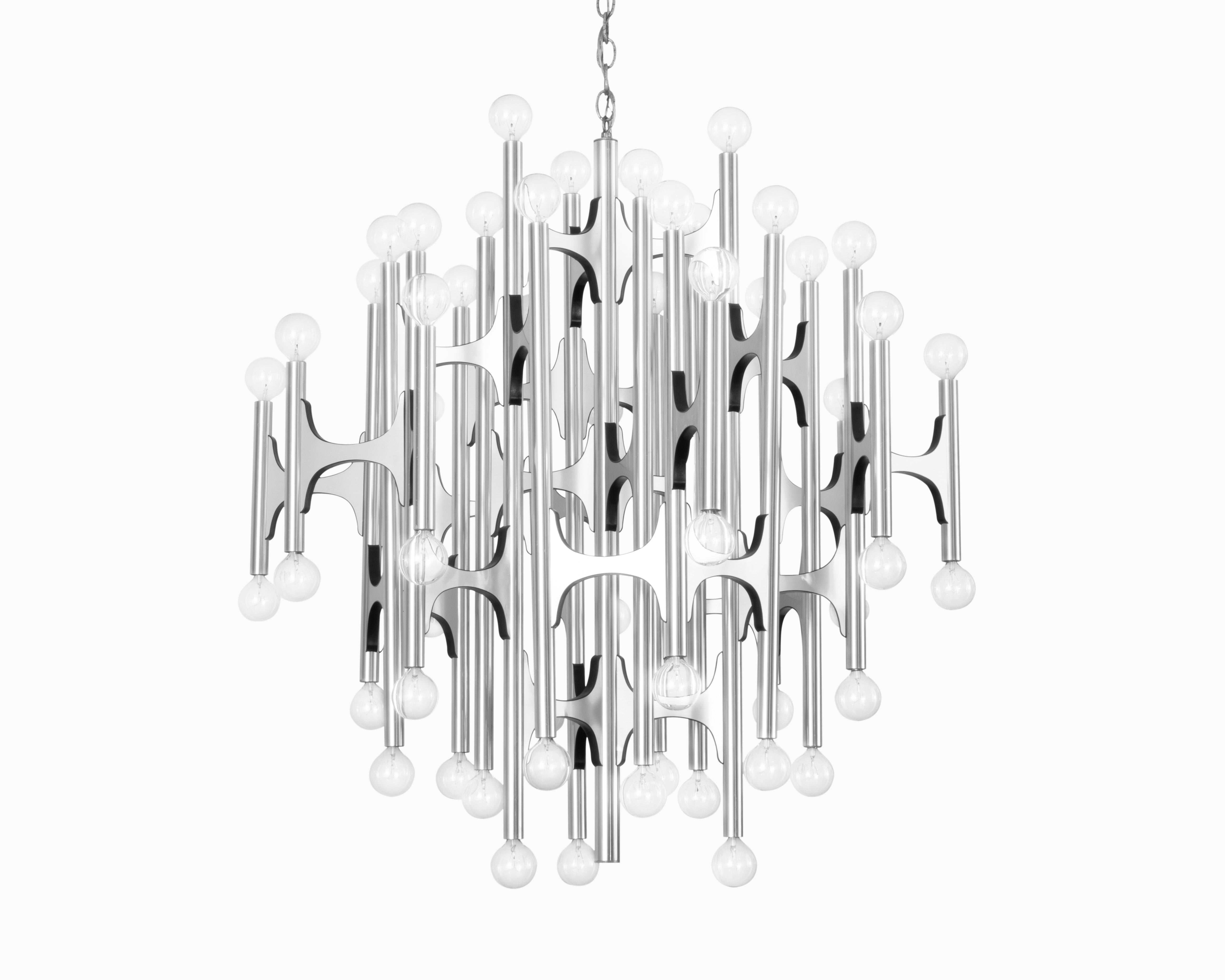 Here is a monumental and captivating chandelier designed by Gaetano Sciolari for Lightolier. The sculptural combination of brushed aluminum and black plastic elements are easy to get lost in, creating a mesmerizing lighting experience. It is in very