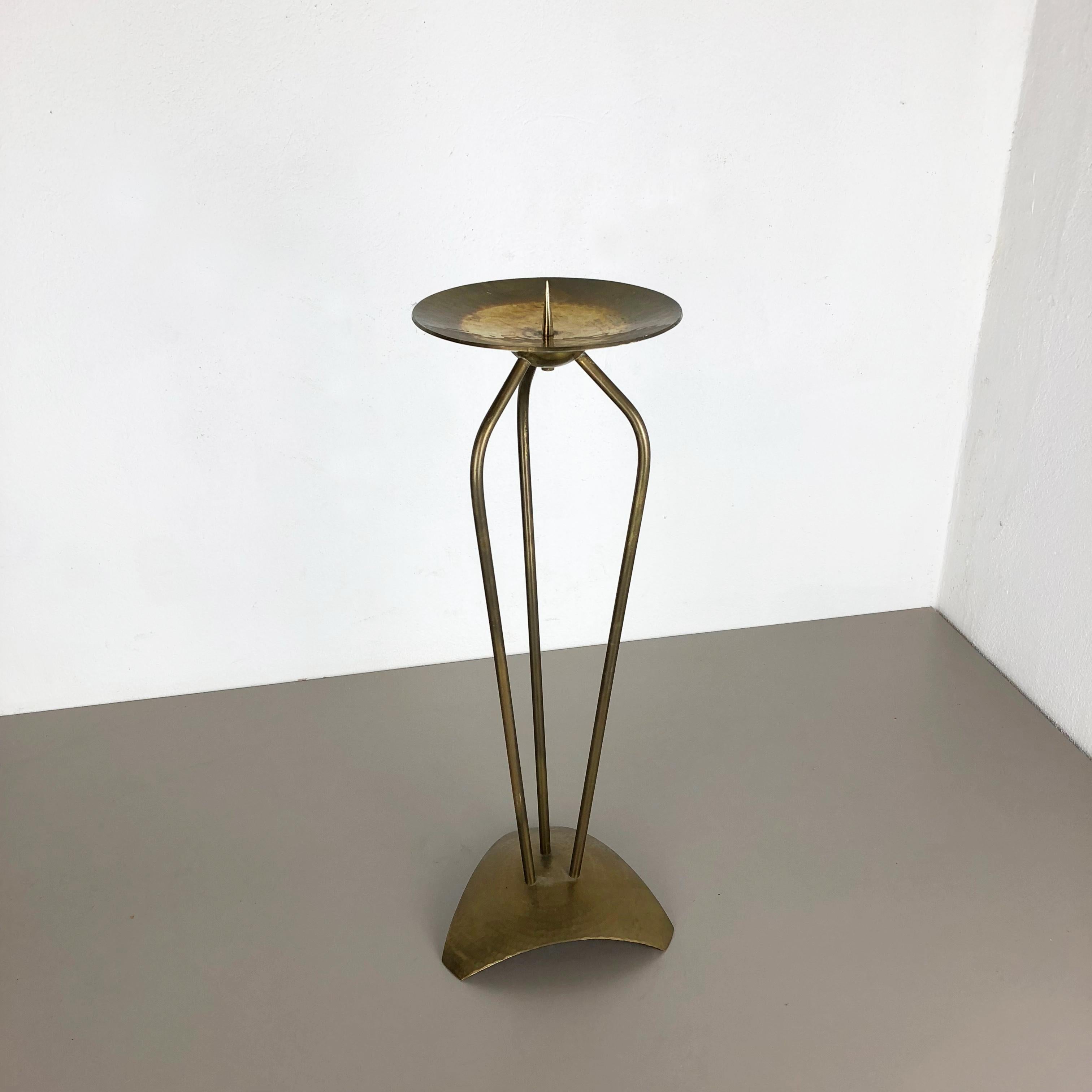 Article:

Sculptural floor candleholder


Origin:

Germany


Material:

Solid brass


Decade:

1950s




This original super large vintage candleholder, was produced in the 1950s in Germany. It is made of solid brass, and has a