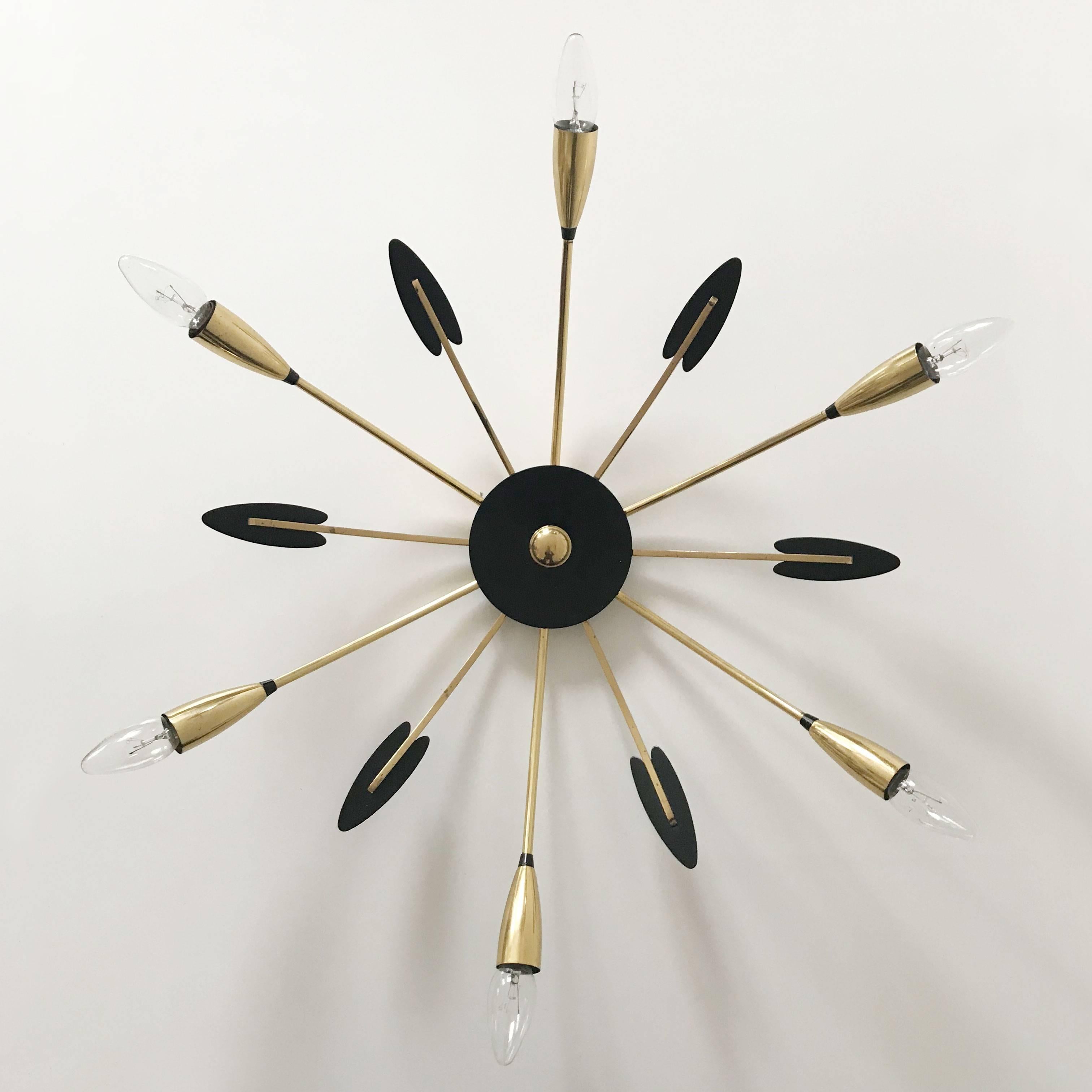 Mid-Century Modern six-armed brass ceiling lamp or wall light. Manufactured in 1950s in Germany.