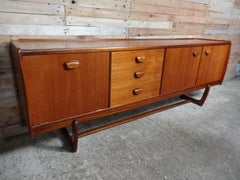 Large 60s Retro Teak Sideboard with U shaped Base, Wave Handles & Drinks Cabinet
