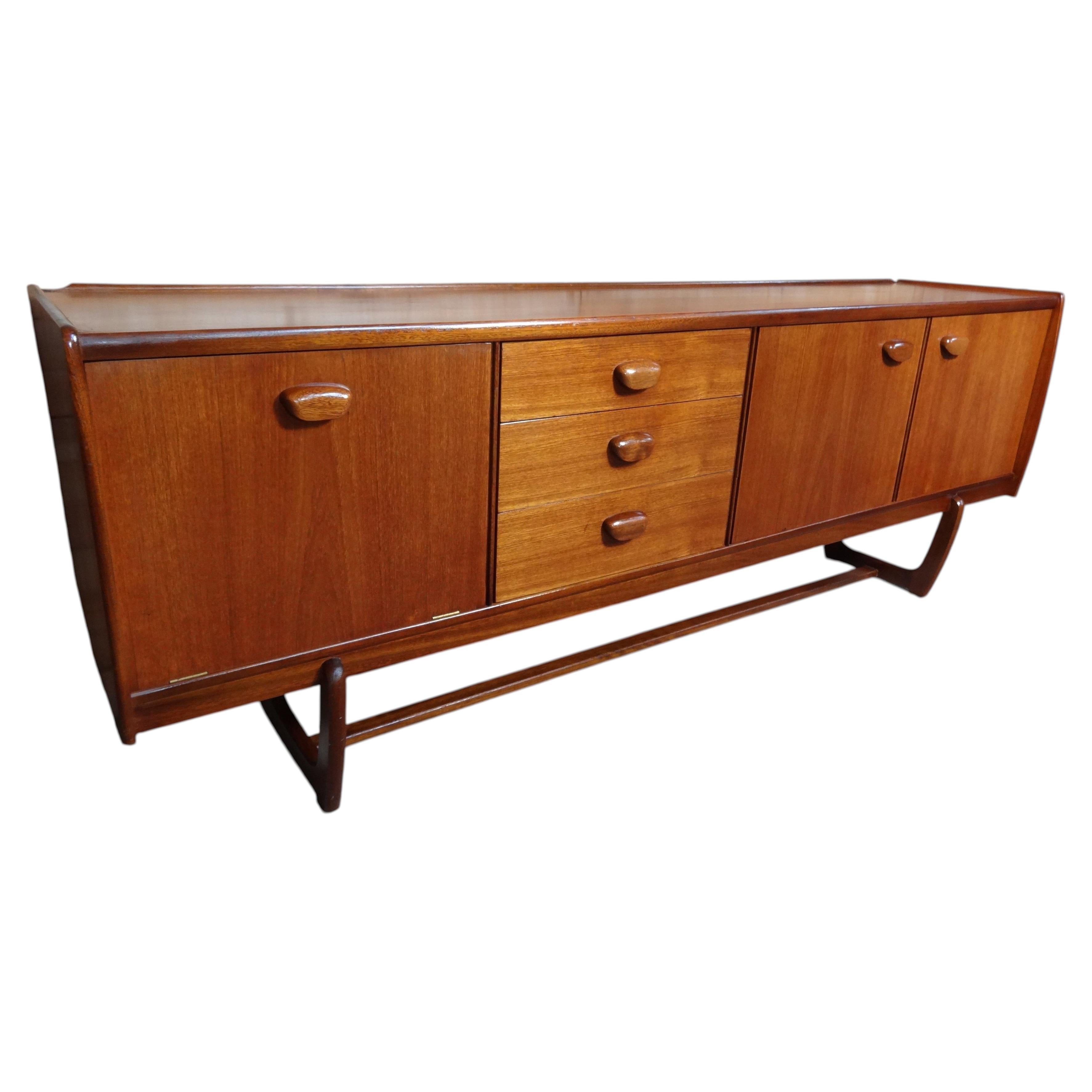 Large 60s Retro Teak Sideboard with U shaped Base, Wave Handles & Drinks Cabinet For Sale