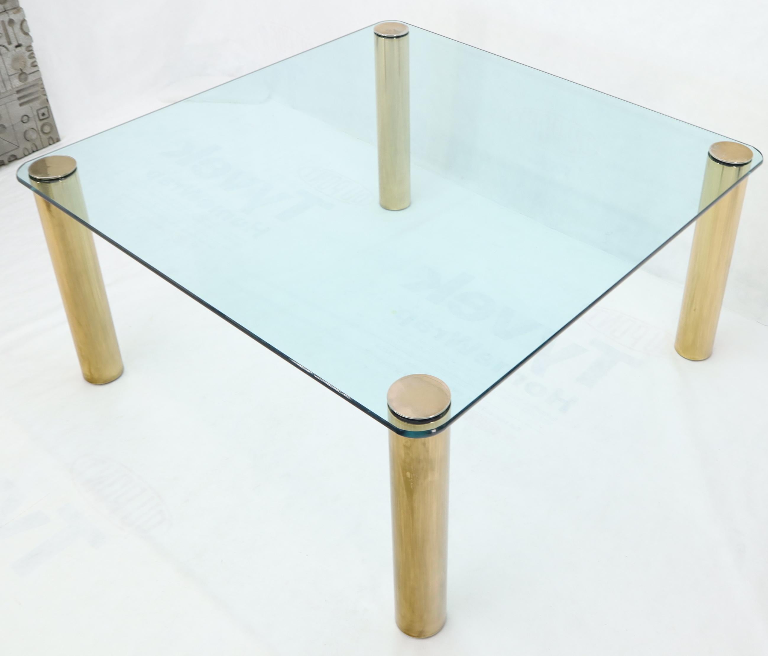 glass table with brass legs