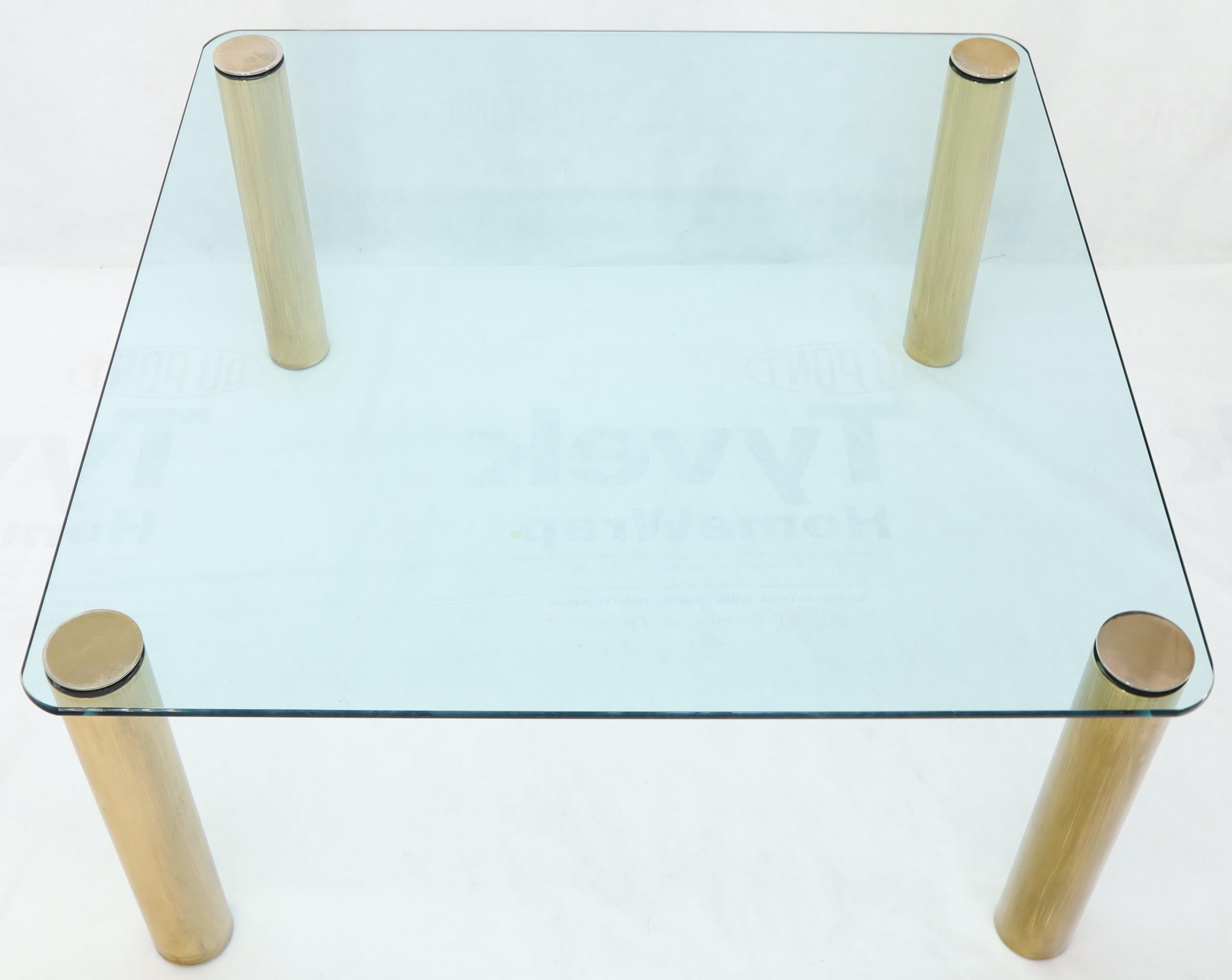 Italian Large Square Thick Glass Top Dining Table on Brass Cylinder Legs For Sale